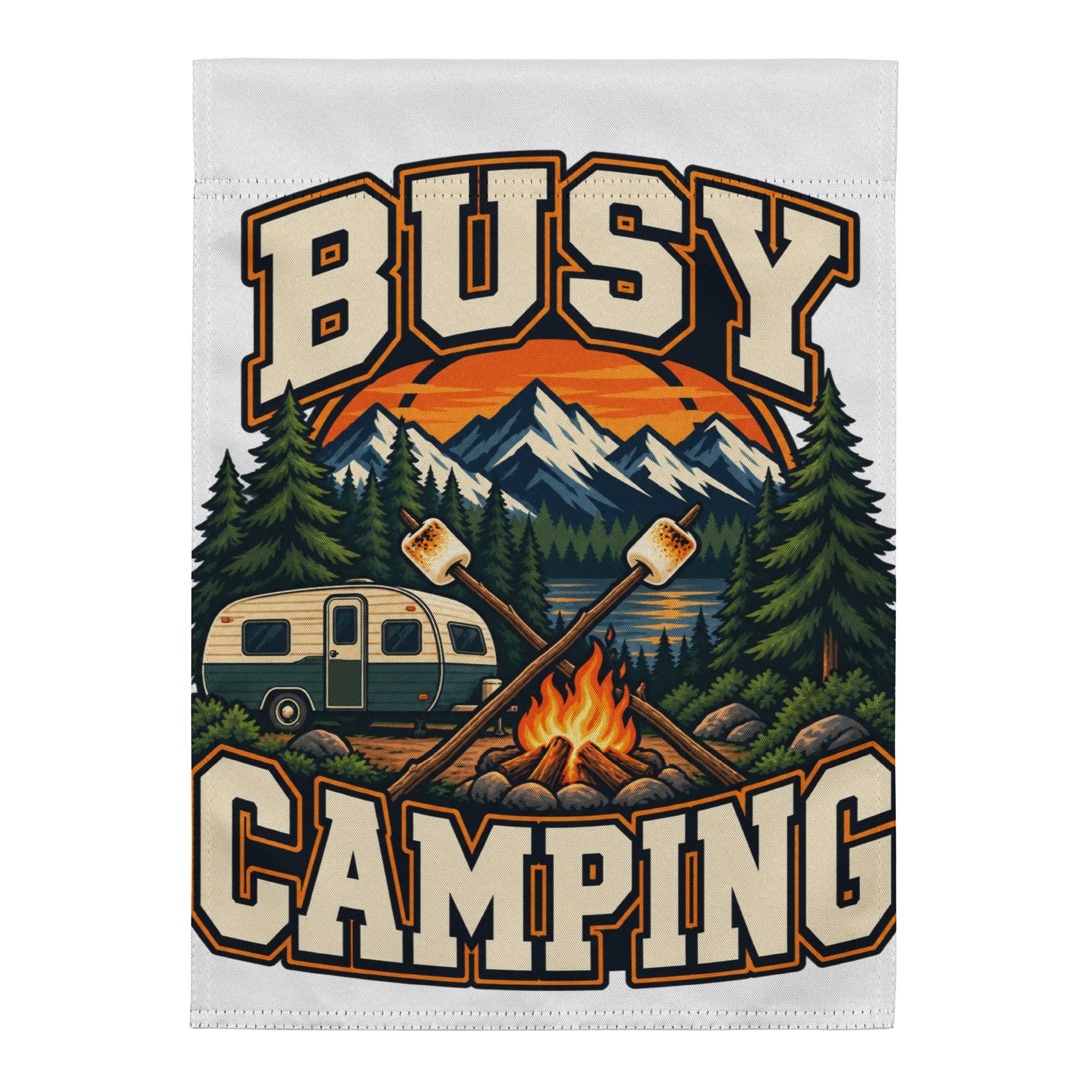 Busy Camping camping garden flag featuring vintage camper, mountains and campfire, 12 by 17 inches, front view