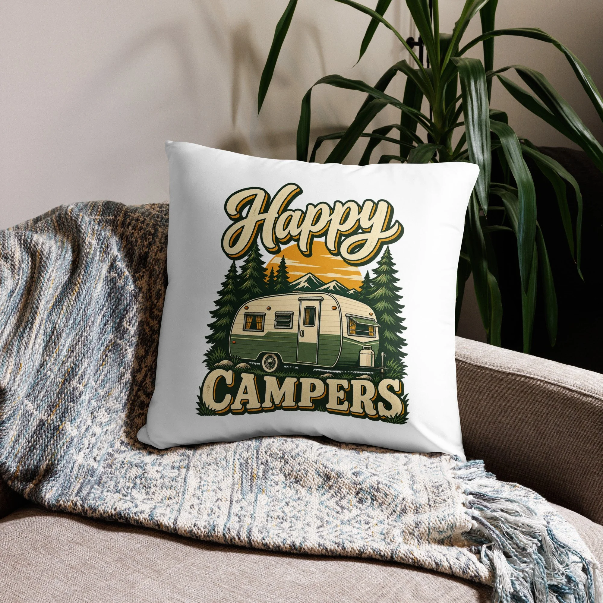 Happy Campers camping throw pillow with vintage green camper and sunset design, 22 by 22 inches, front view