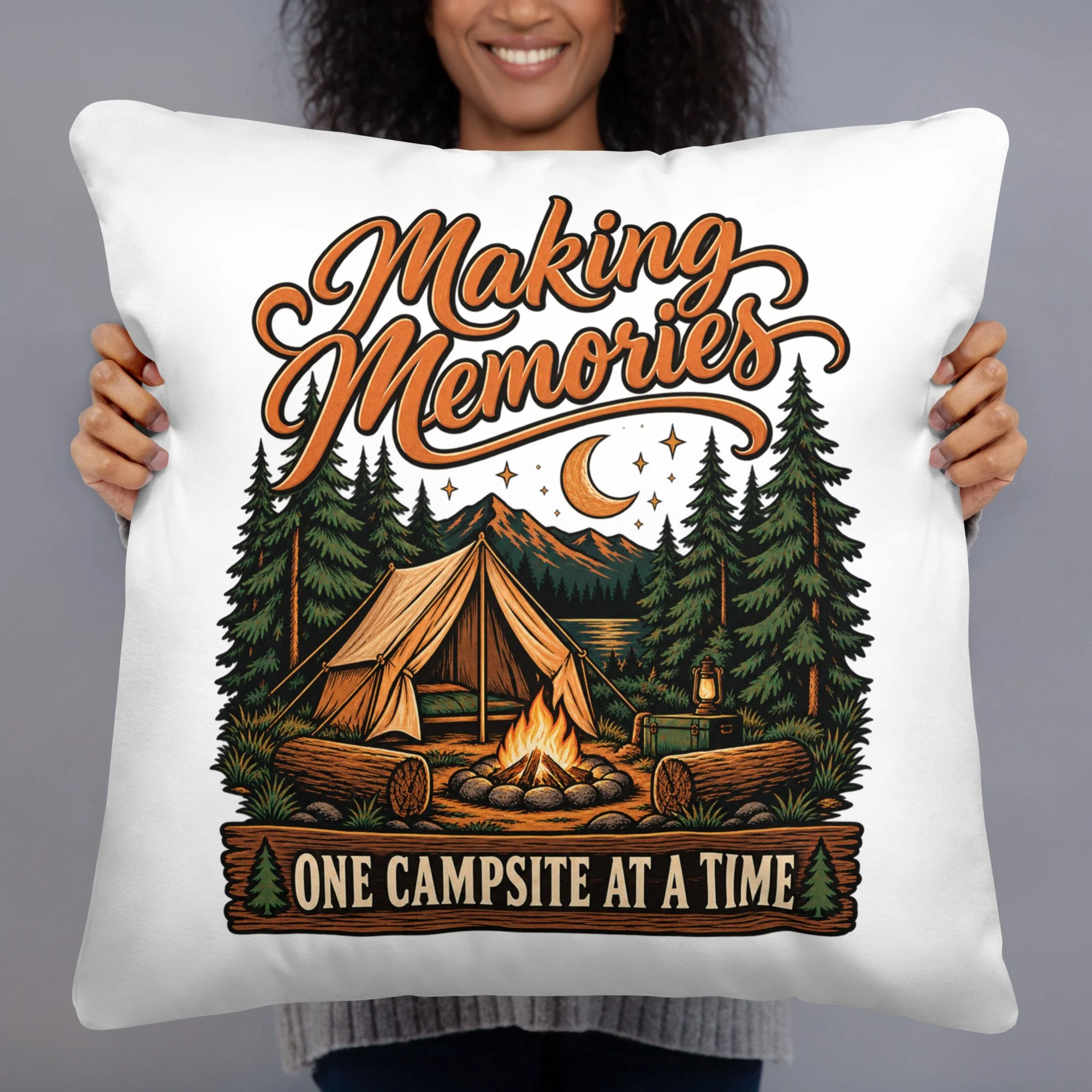 Making Memories camping throw pillow with tent and campfire design, 22 by 22 inches, front view