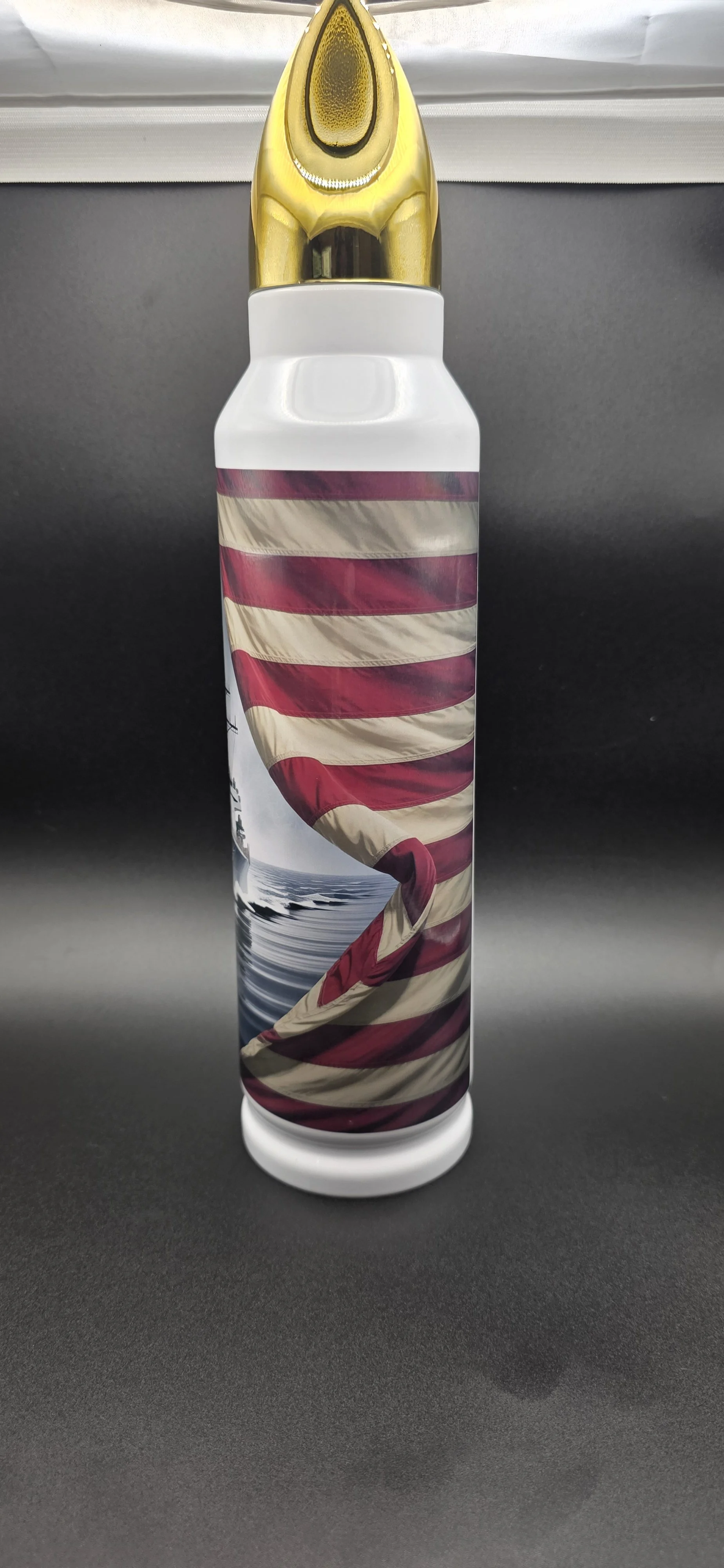 Full view of a personalized U.S. Navy bullet-style tumbler featuring an anchor, American flag, and naval warship design