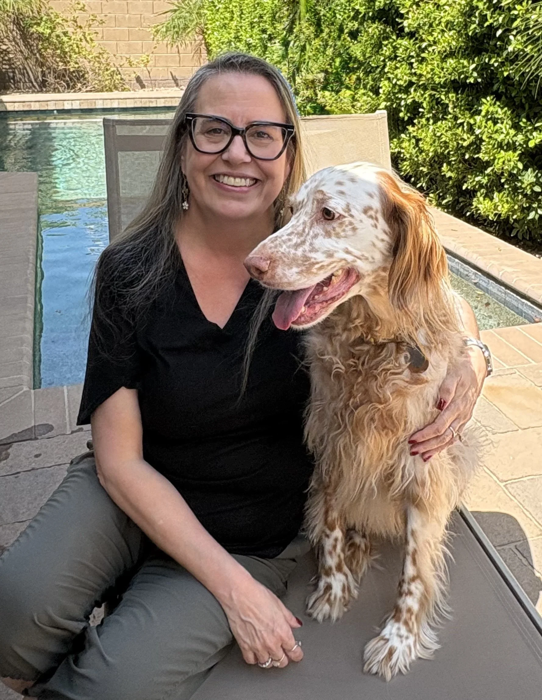 Monika Peltz with her dog outdoors in Chandler, Arizona.
