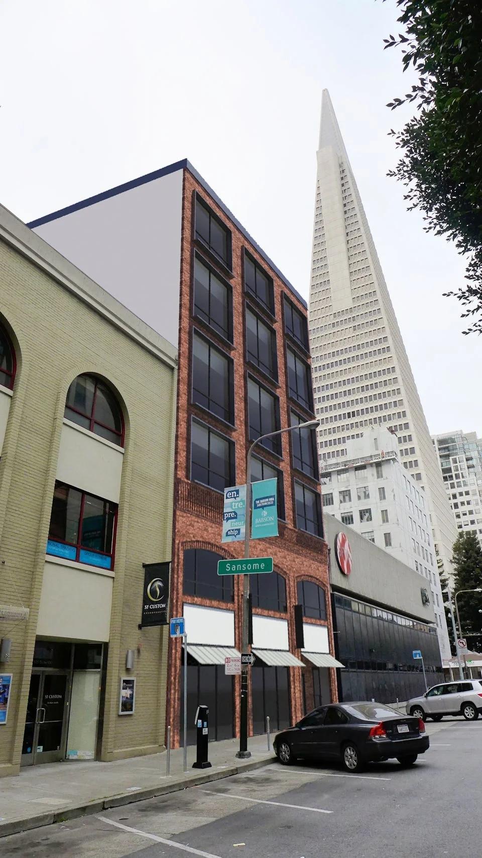 City street with office buildings, including the Salesforce Tower, and parked cars in San Francisco, California.