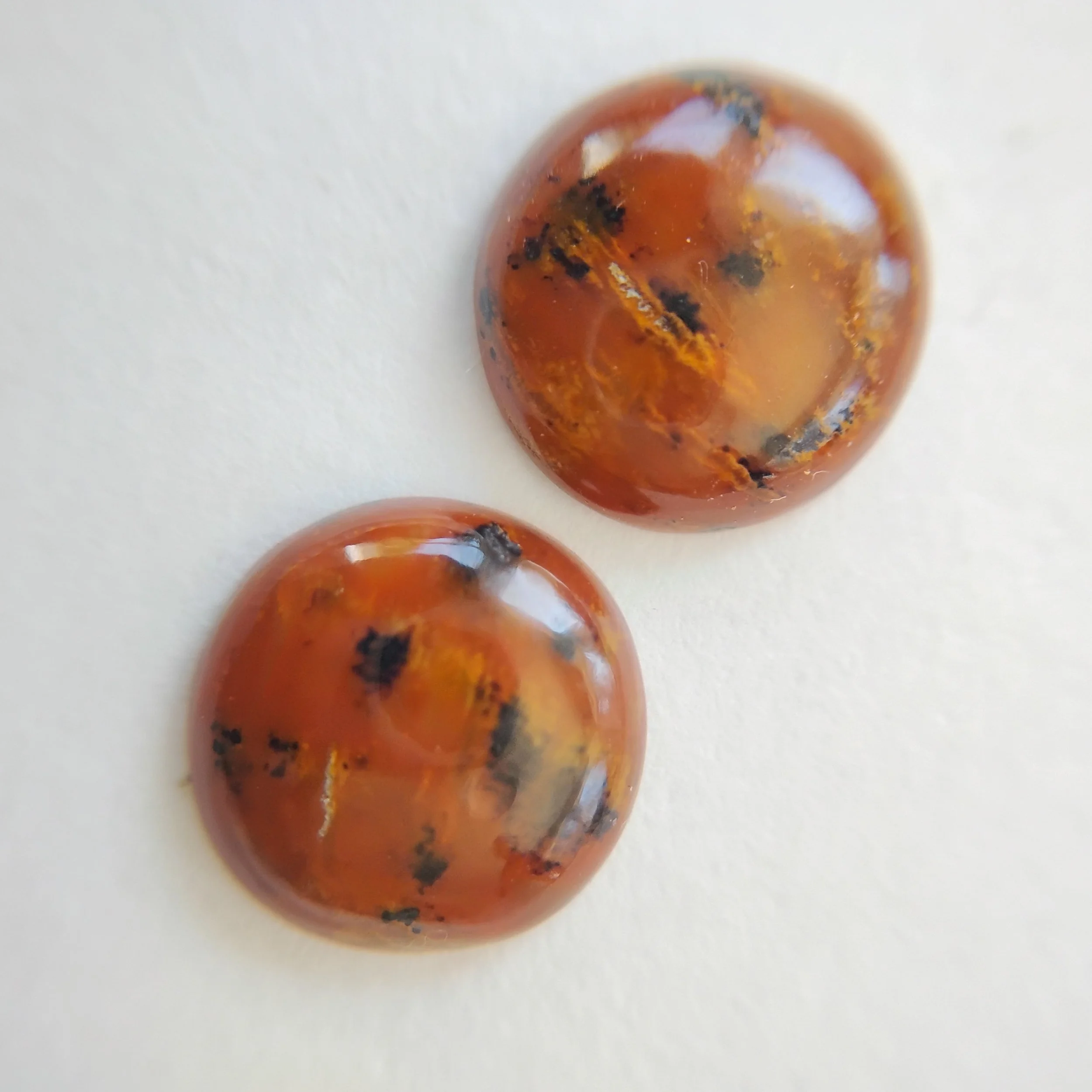A pair of opal earrings pieces, cut by world-renowned Master Lapidary Marshall Curran