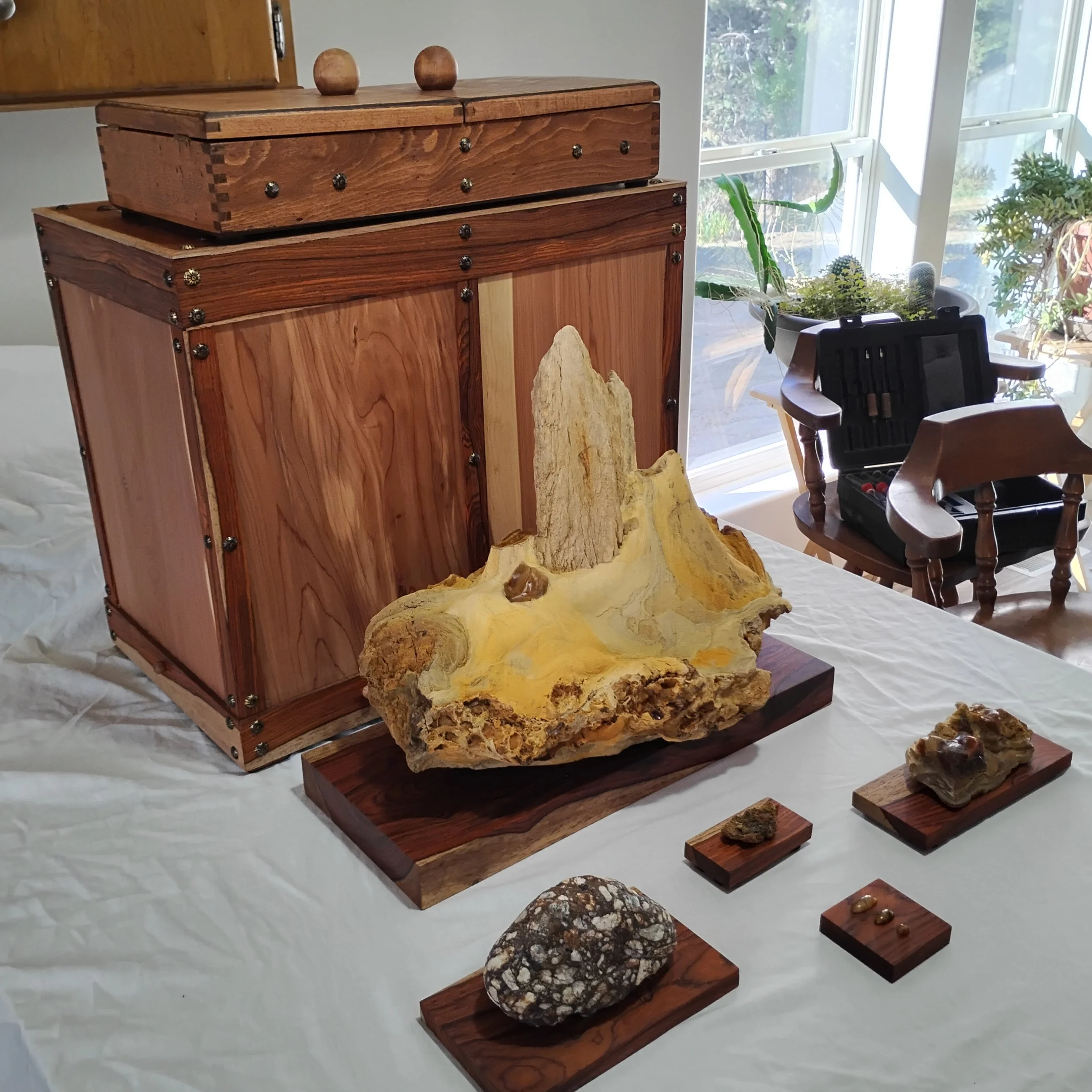 The Becky Stone and all of Her supporting cast members. Each piece sits atop a custom, hand-carved Cocobolo Rosewood Daiza. Her display box is hand-crafted from Red Cedar Heartwood. Her storage box is crafted from Antique Romanian Beechwood.
