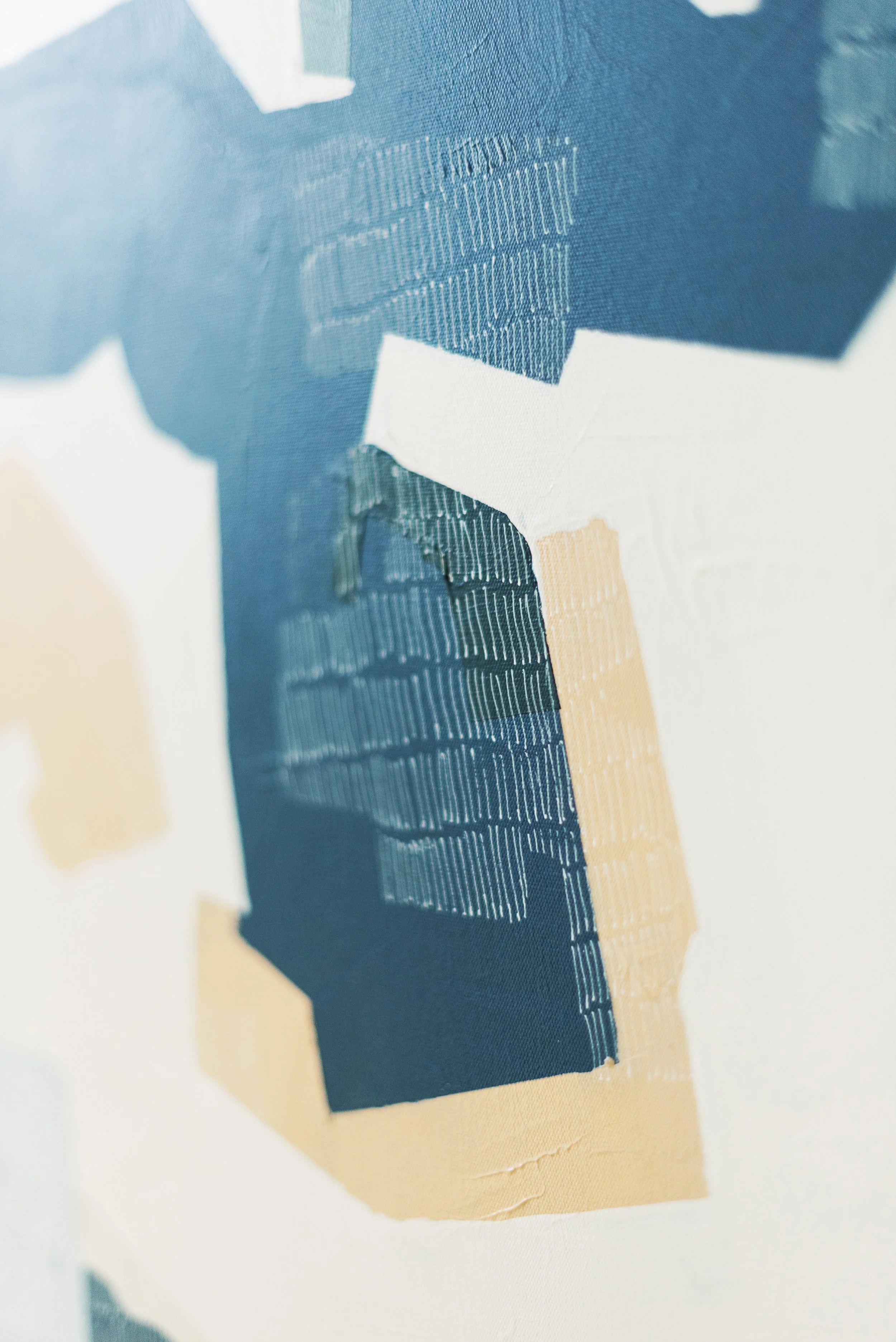 Close-up image of a printed page with layered paper and a portion of a barcode visible.