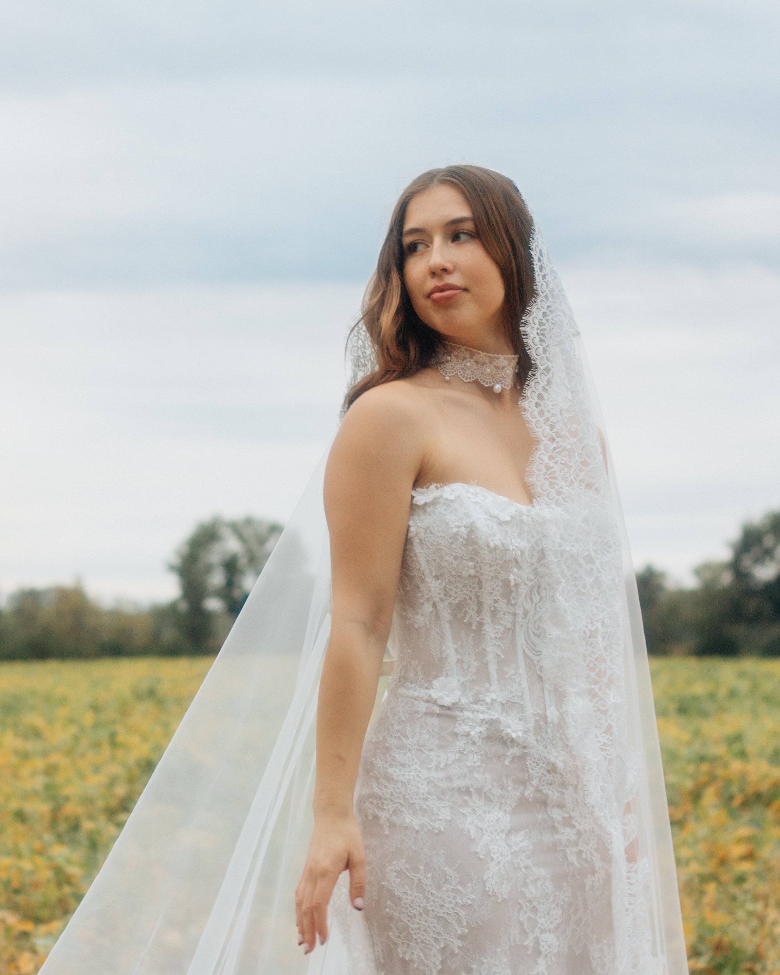 Fitted strapless sheet lace wedding gown by Maggie Sottero
