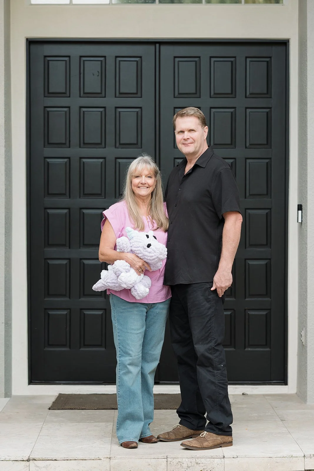 Joe and Tiani Mattus with a handmade Cuddle Companion at their home in Florida.