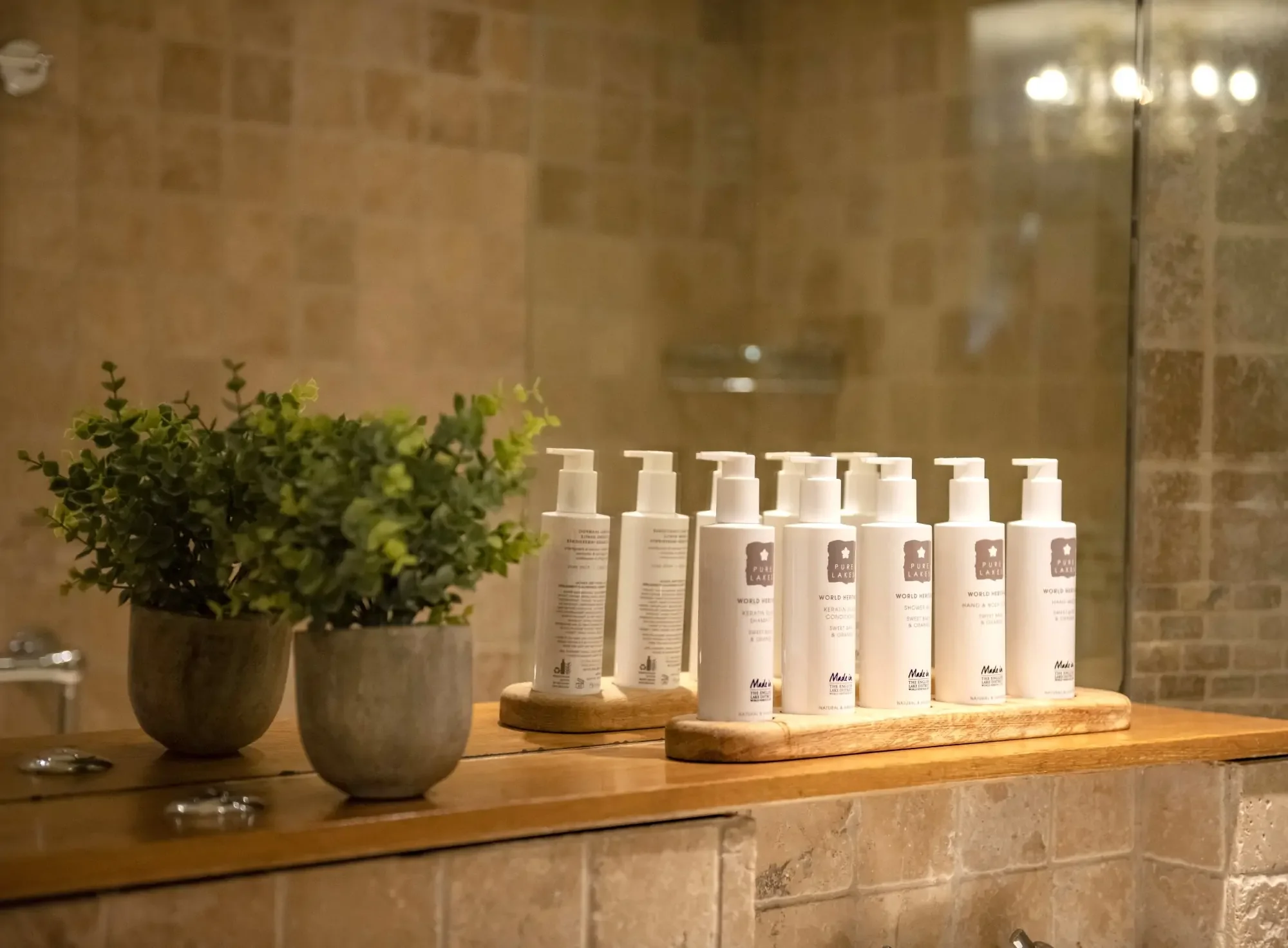 The-Rowley-Estates-Garden-wet-room-Pure-Lakes-toiletries.webp