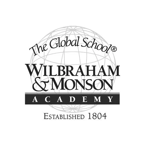 Wilbraham & Monson Academy logo with globe, “The Global School,” and “Established 1804” text
