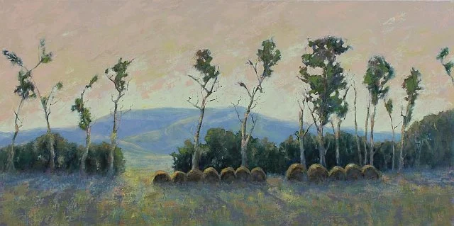 Painting of old trees and haybales.