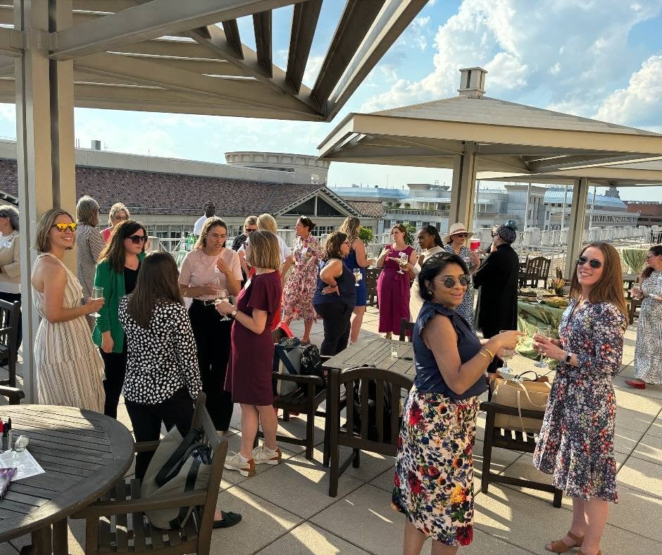A large group of women enjoy a summer WCF gathering.