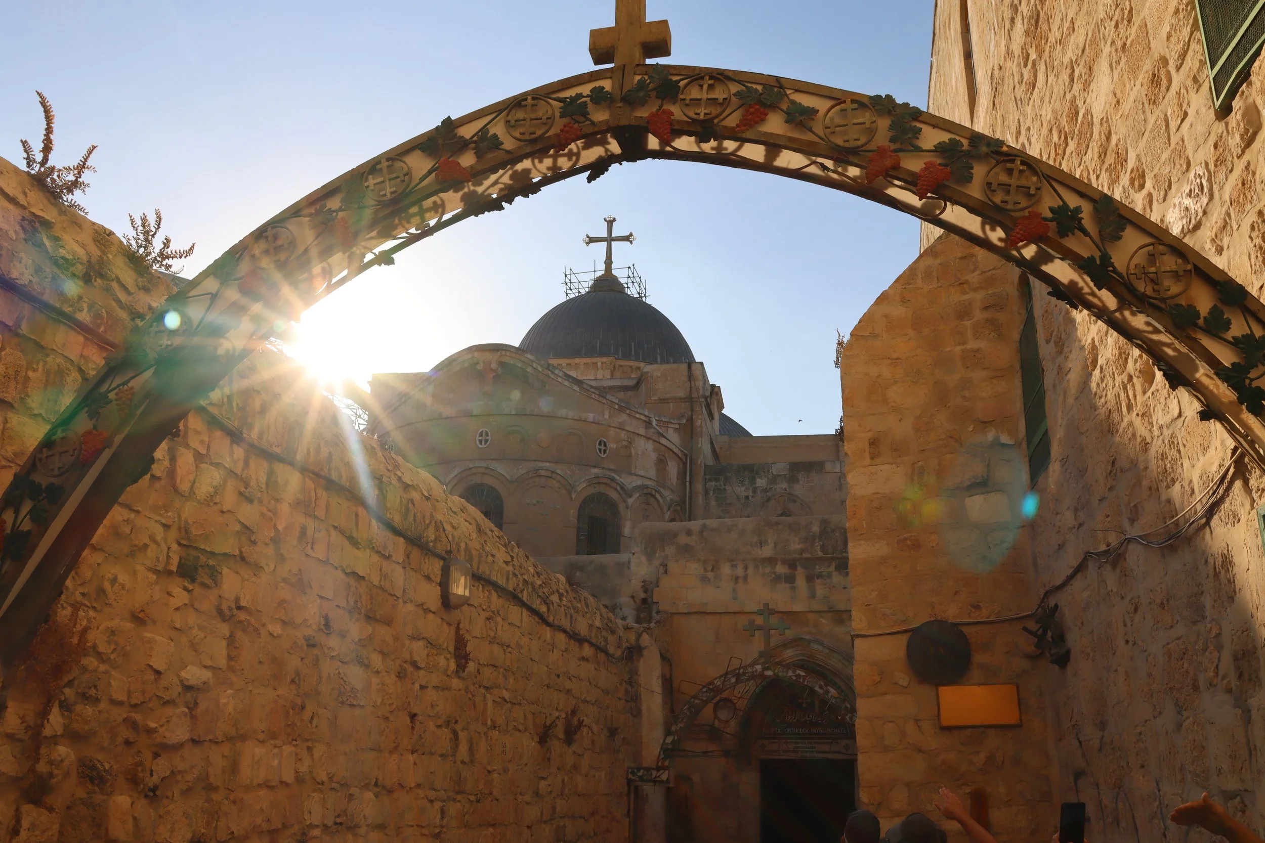 View of Jerusalem's hills and historic buildings, including the golden-domed Church of the Holy Sepulcher