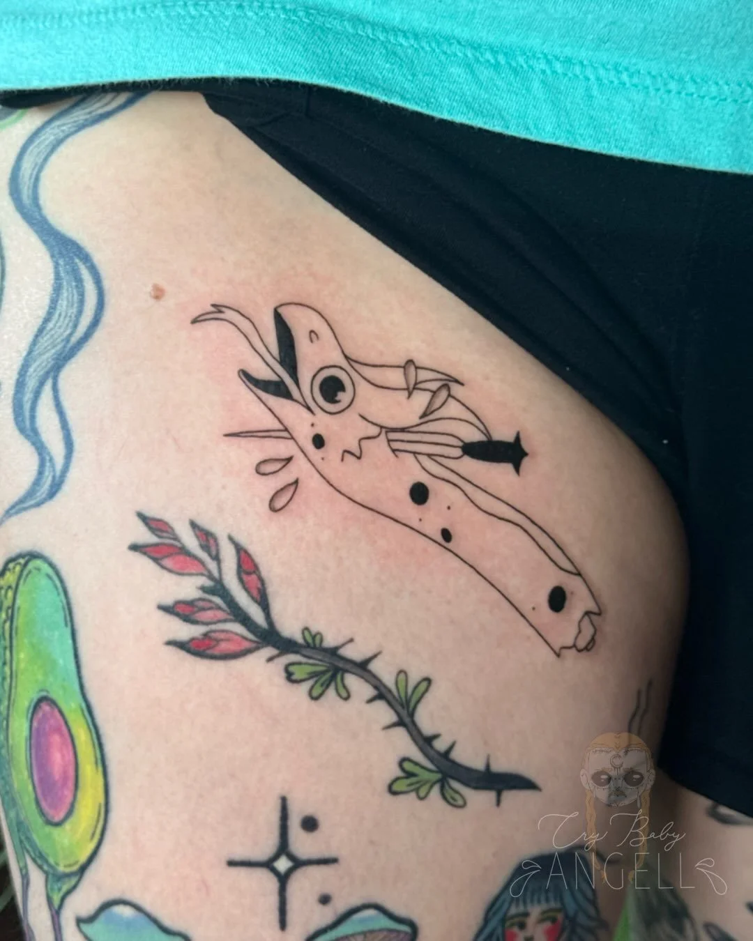 Dragon head 🤪 

Thanks Kay ( @clowdercircus ) for getting another tattoo from me! I loved getting to fill this space in your thigh. &hearts;️ 

Hi! I&rsquo;m Angell! I&rsquo;m a tattoo artist in Aurora, Colorado at @deadlettertattoo I also guest spo