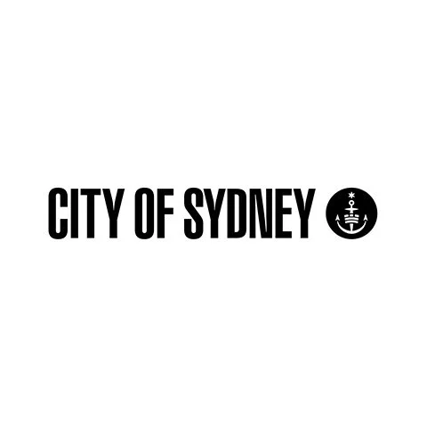 Black and white logo of the City of Sydney with an anchor symbol within a circle.