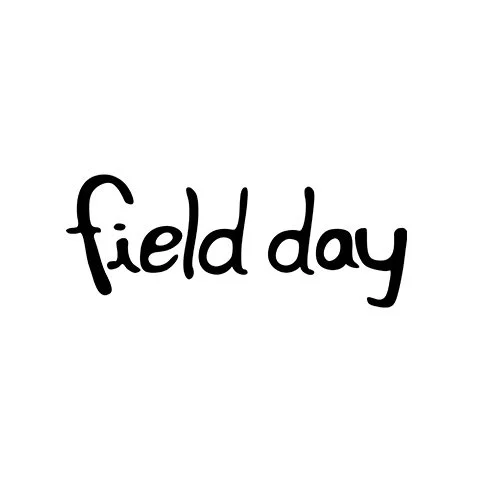 The image contains the words "field day" written in black, casual, handwritten style font on a white background.