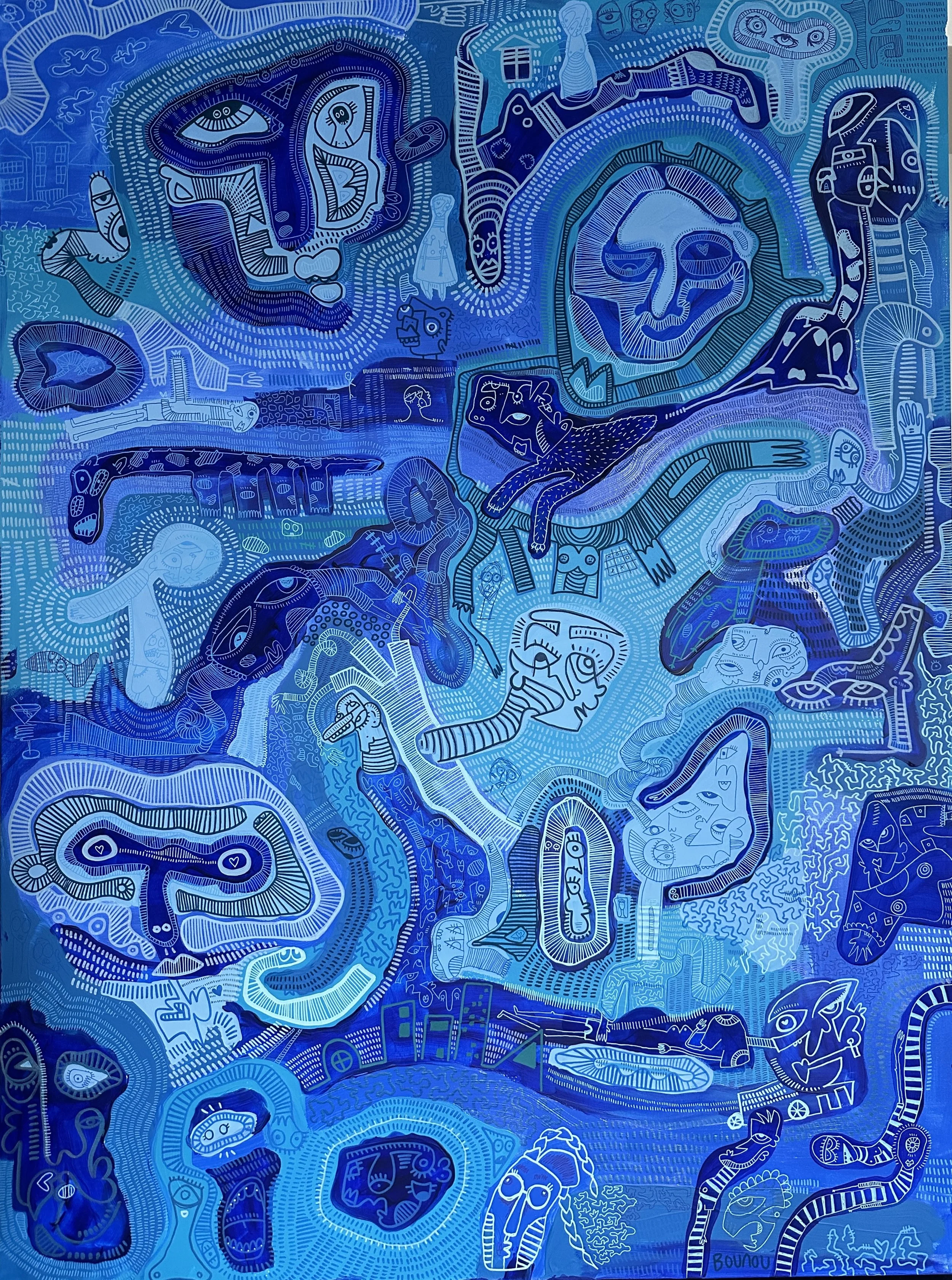 A vibrant, abstract mural painted in shades of blue with cartoonish figures, faces, animals, and various whimsical elements all interconnected in a complex, lively composition.