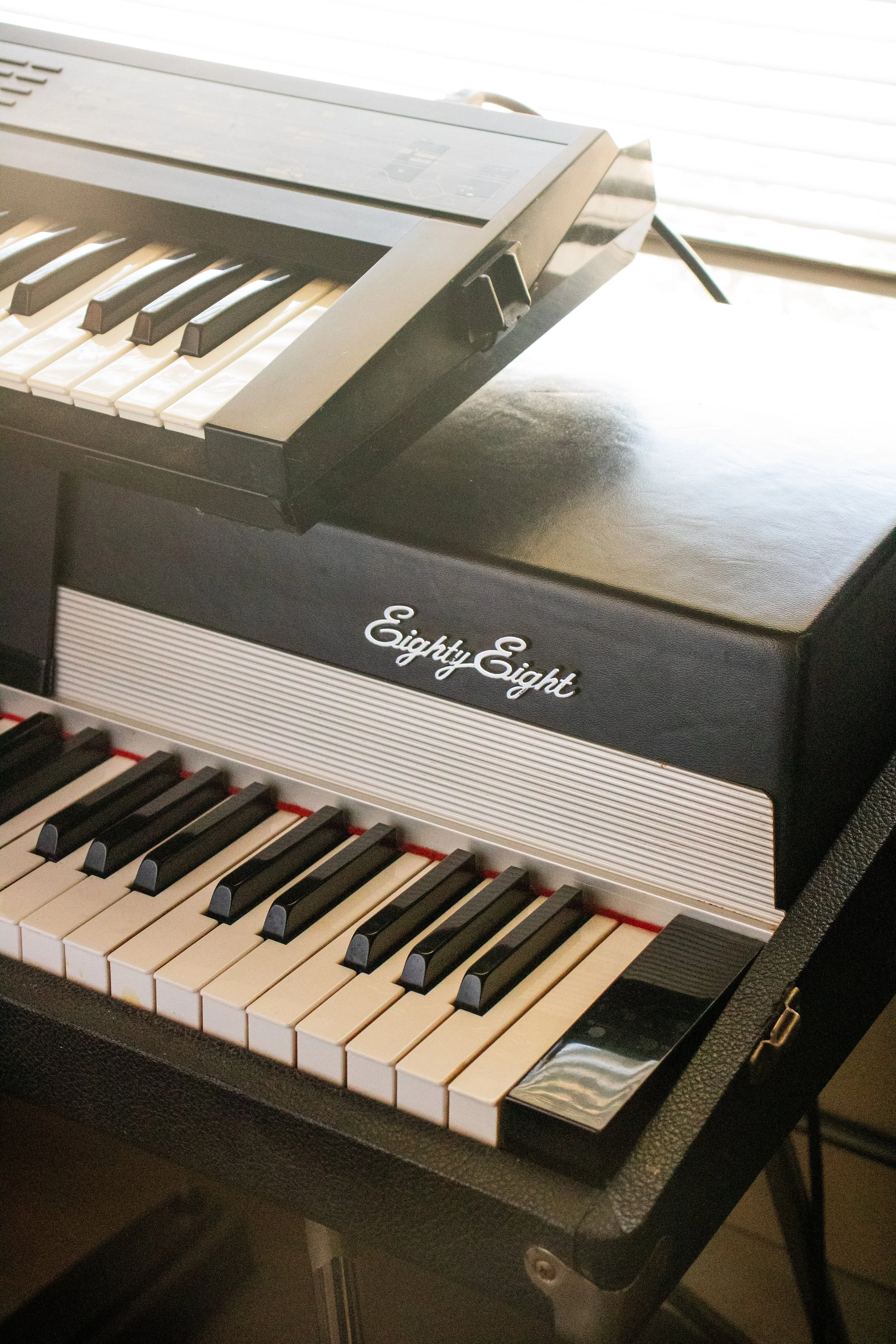 Danna's November 1976 Mk. I Rhodes Stage Piano, with a 1987 Roland D-50 Linear Synthesizer atop it.