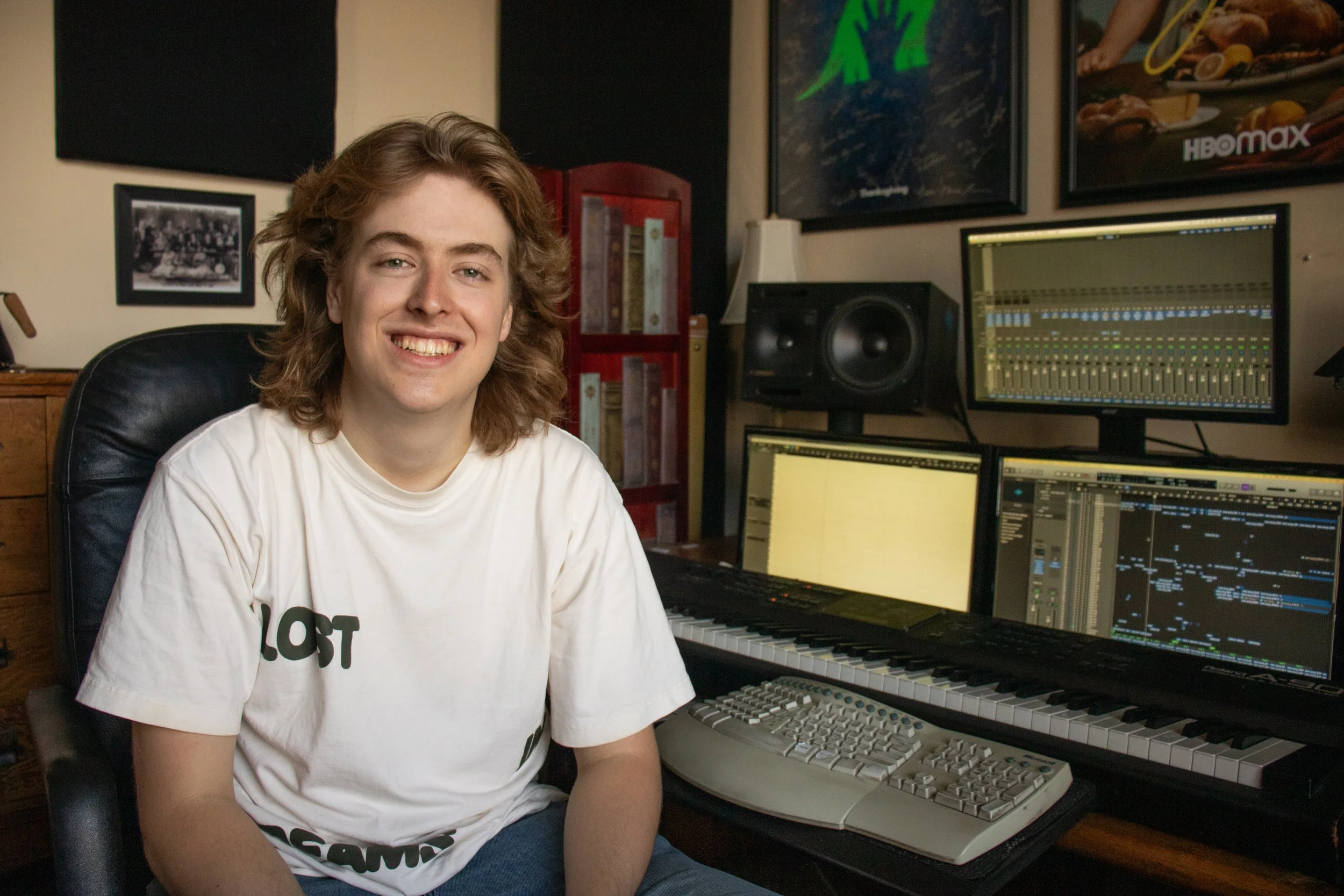 Danna sitting in his studio.
