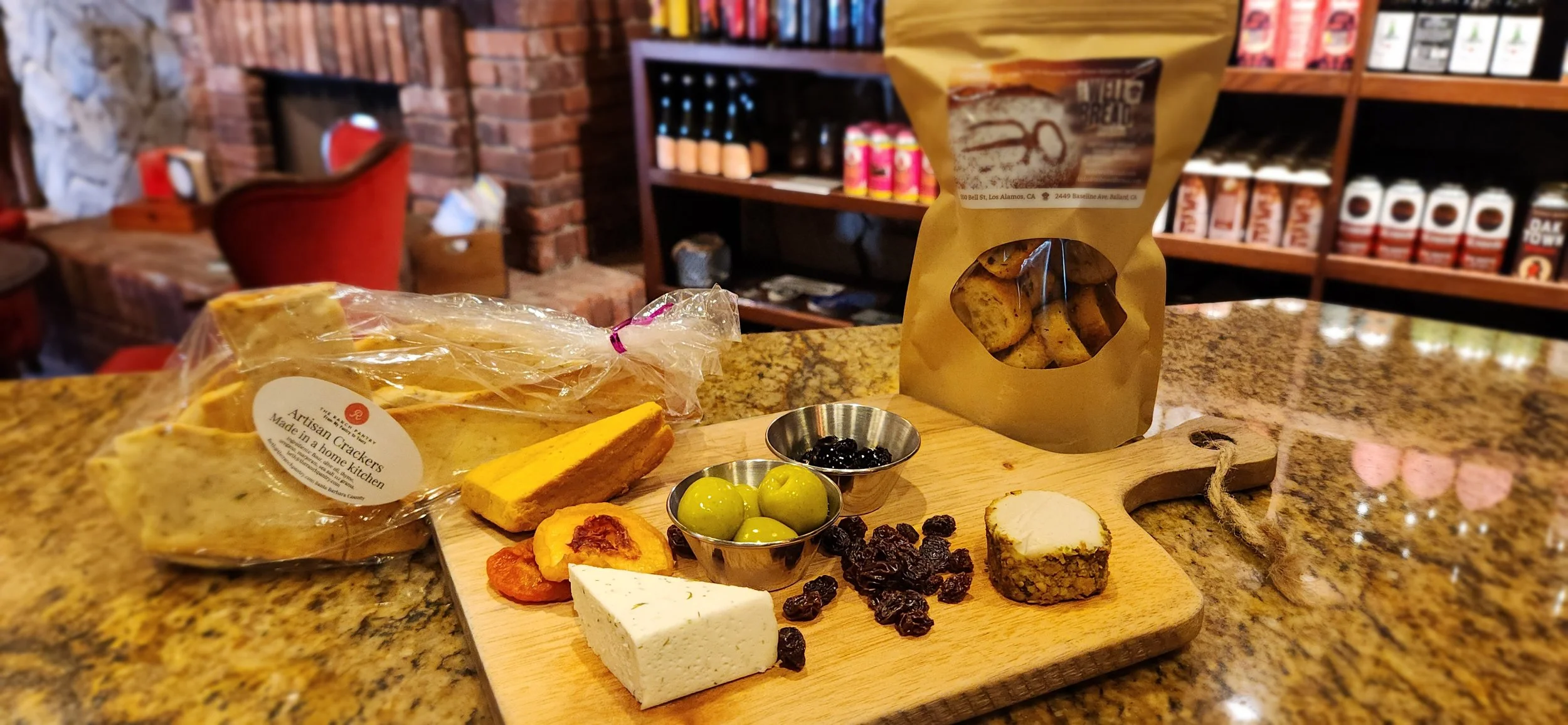 vegan, plant based, cheese, charcuterie, nuts, olives, chocolate and small bites on a platter at the good life in santa ynez valley