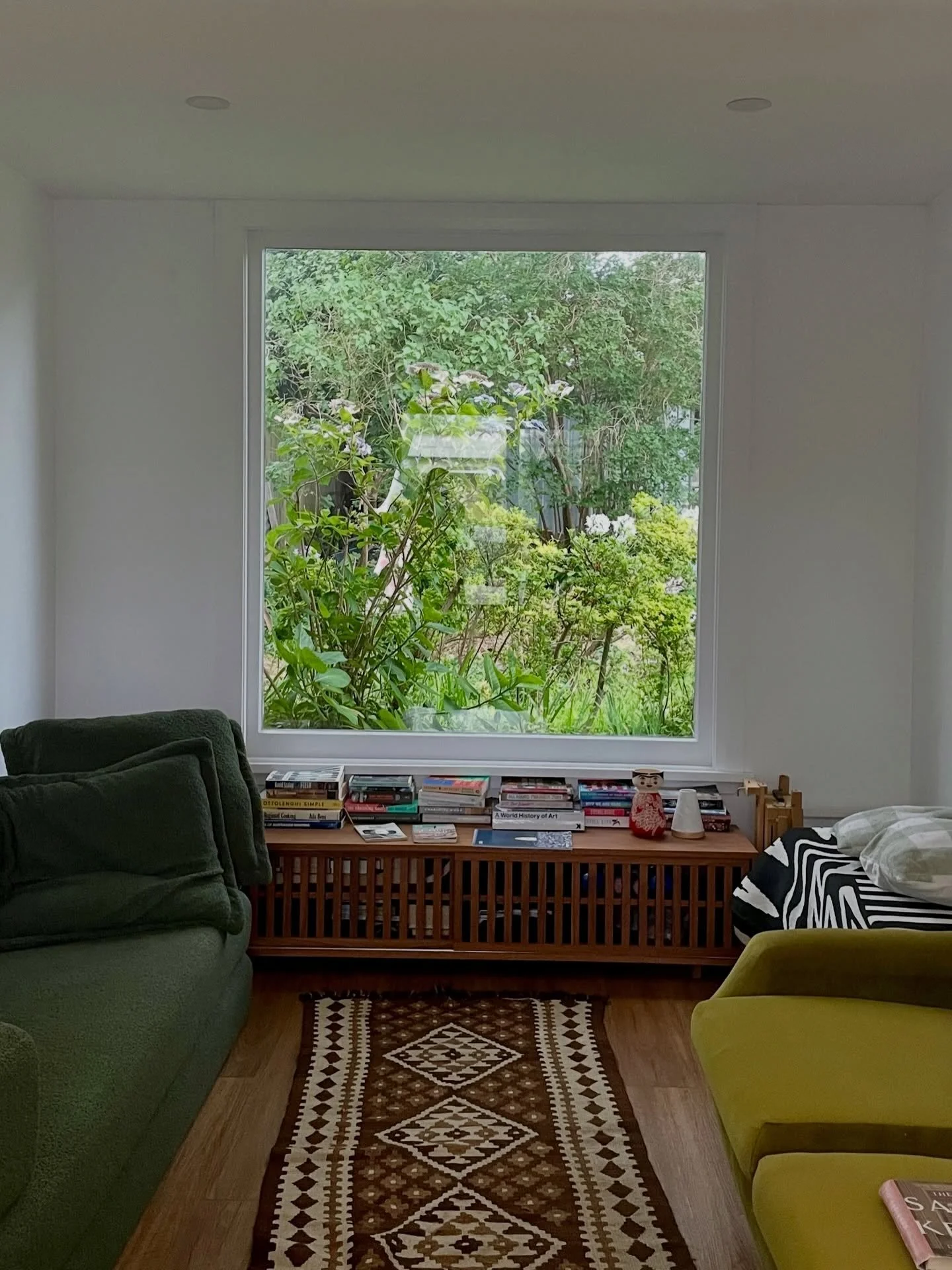 Check out this incredible shed to studio makeover in Katoomba. A statement recycled window connects the indoors to the garden, perfect for a guest room and home office. 
#carpenter #renovation