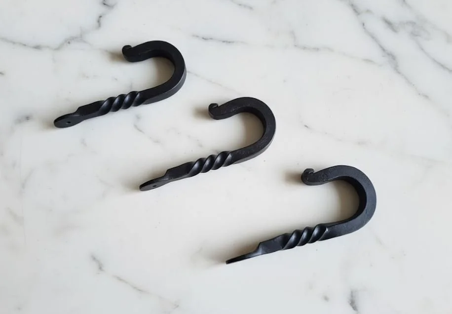 Hand forged hooks with a twist