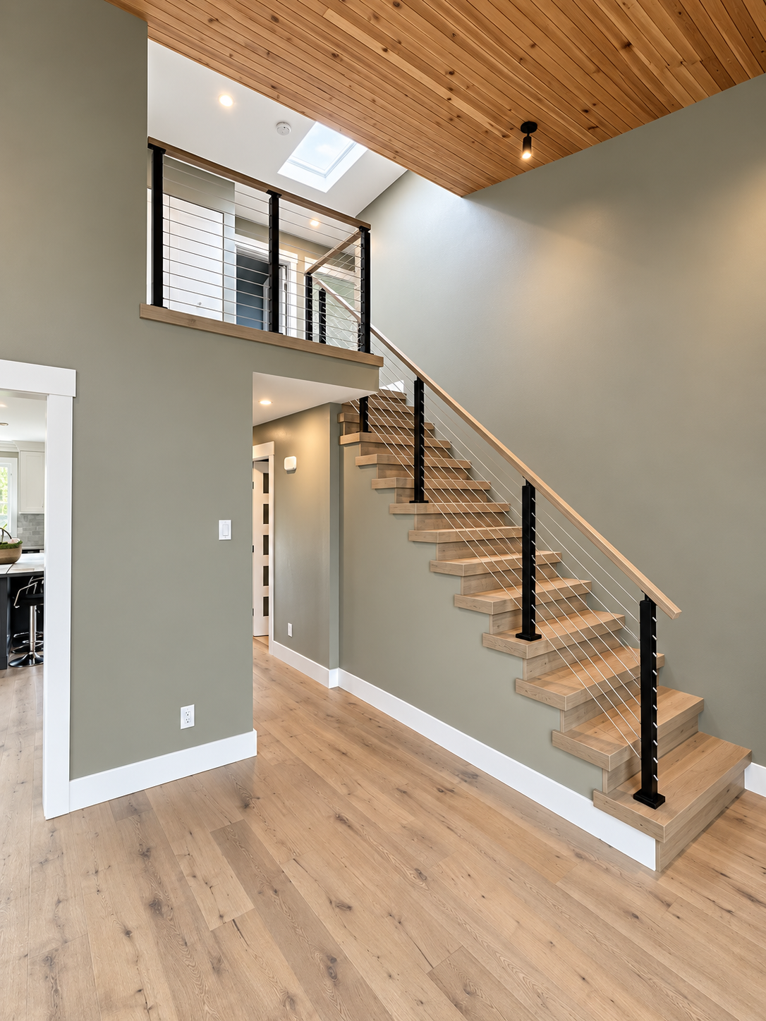 Timber staircase beneath a cedar ceiling