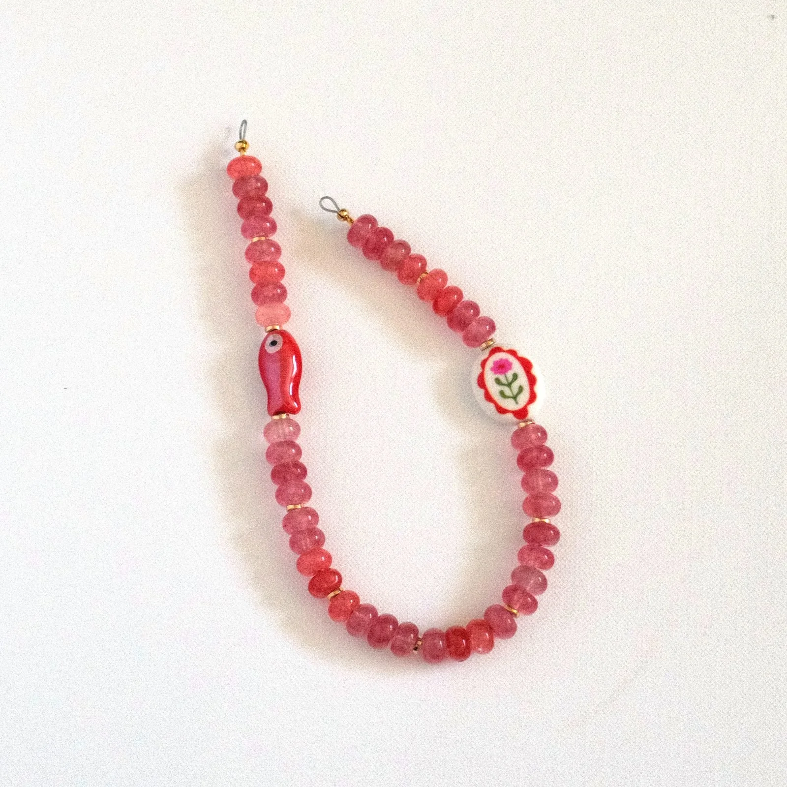 cherry pit — beaded phone charm