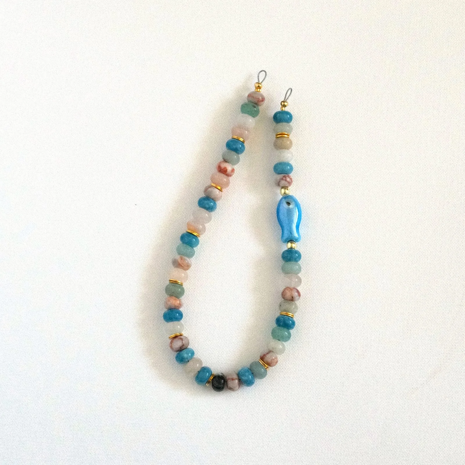 the shallows — beaded phone charm