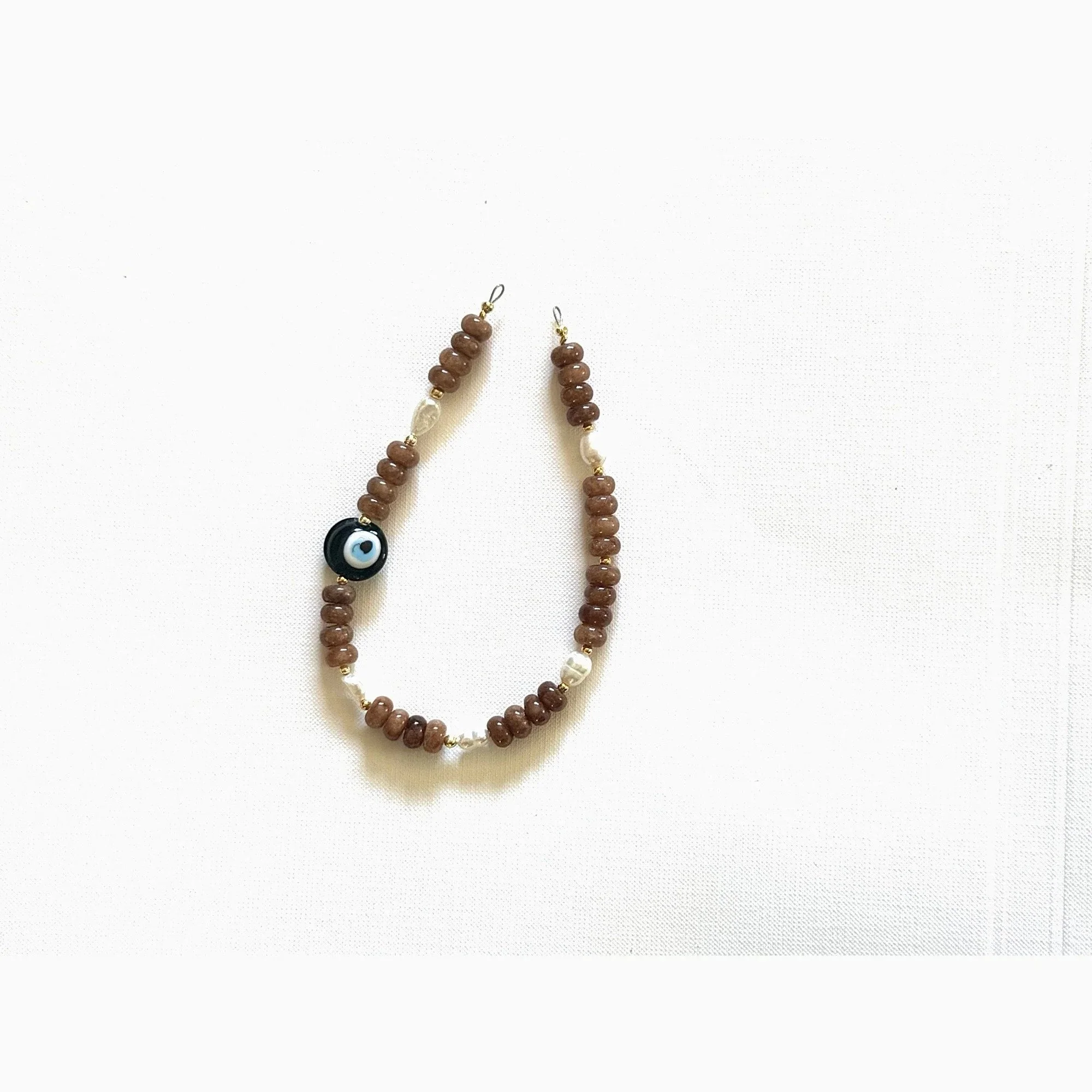 umber — beaded phone charm