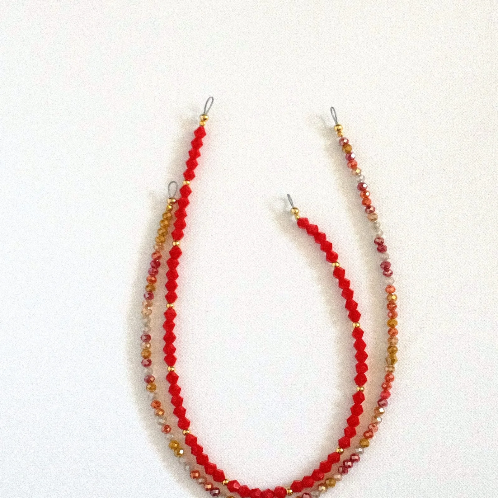 the ruby rope — beaded phone charm