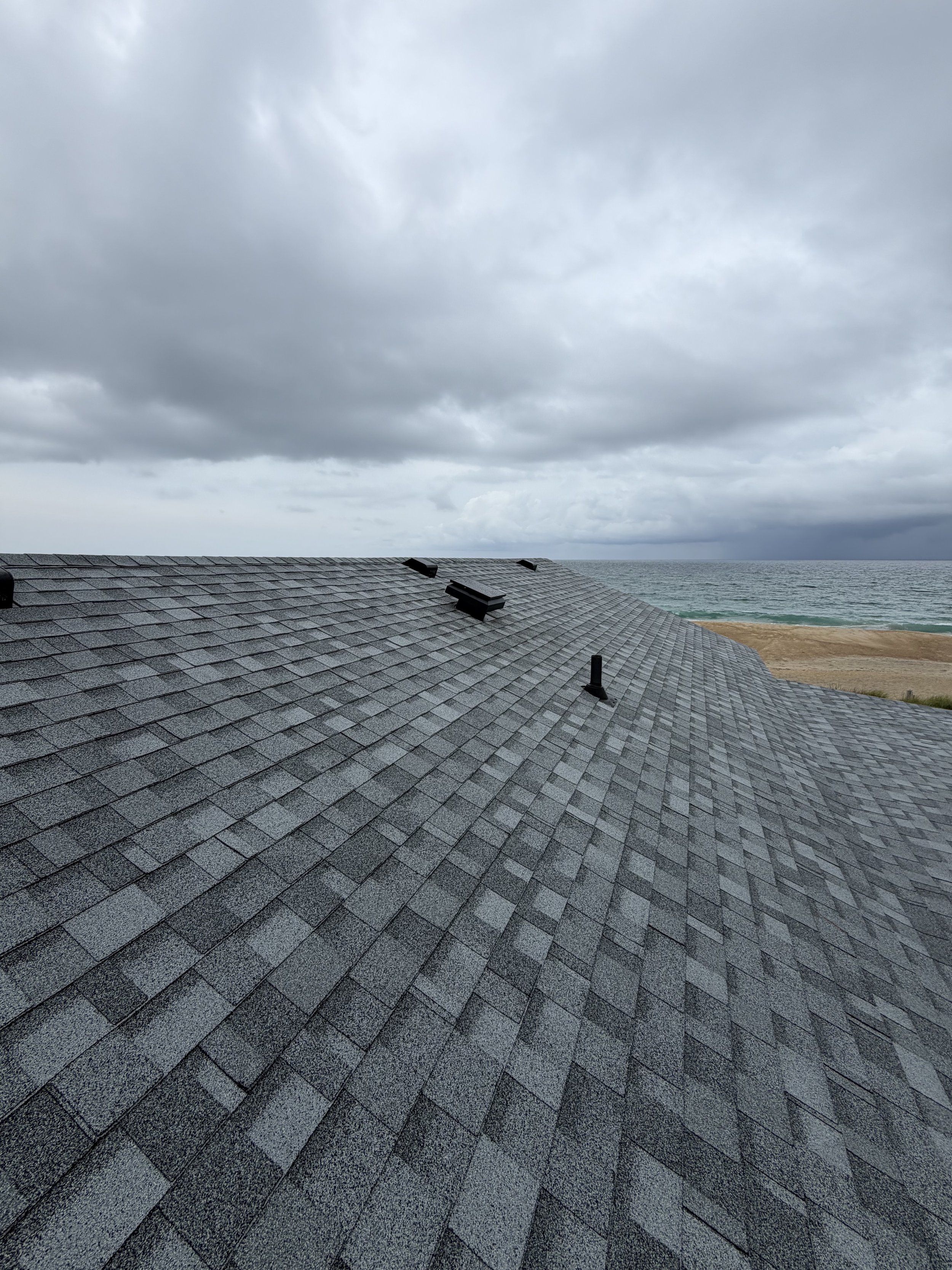 Oceanfront shingle roofing by Alpha Exteriors in the Outer Banks.