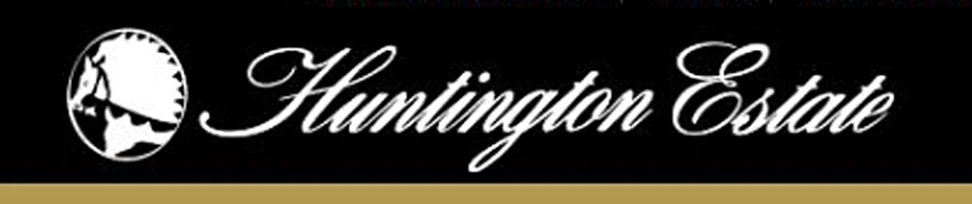 Logo for Huntington Estate with a globe icon and elegant script font