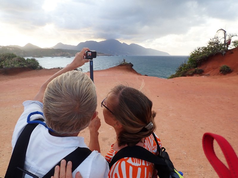 Taking photos at the Red Rocks near Calibishie. This is on one of Eddison's Tours