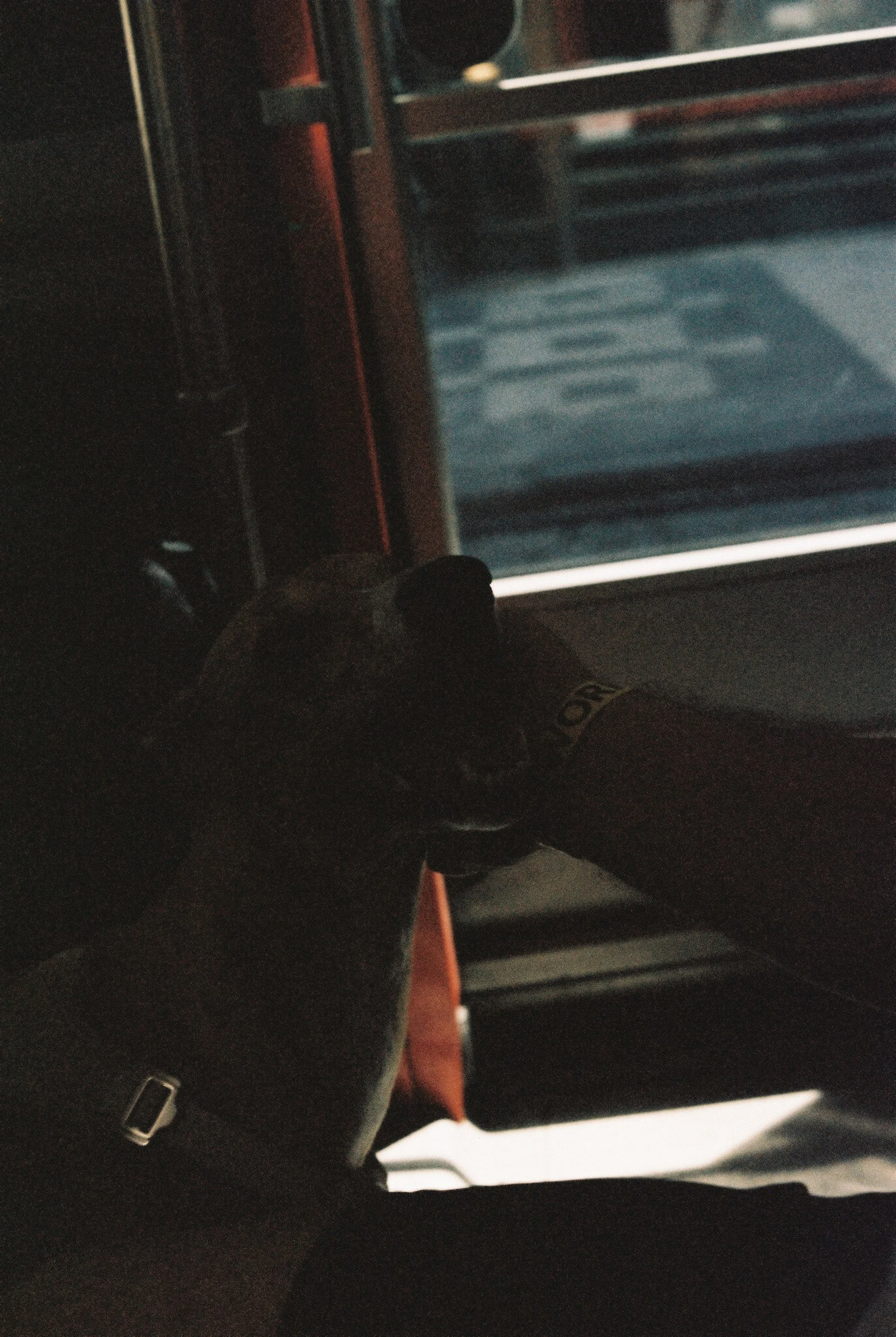  This is the only underexposed, beat-up frame from the roll. I tried to photograph Art inside the tram and most likely messed up both the shutter speed and the aperture. As the saying goes, in analog photography you can get away with overexposure, bu