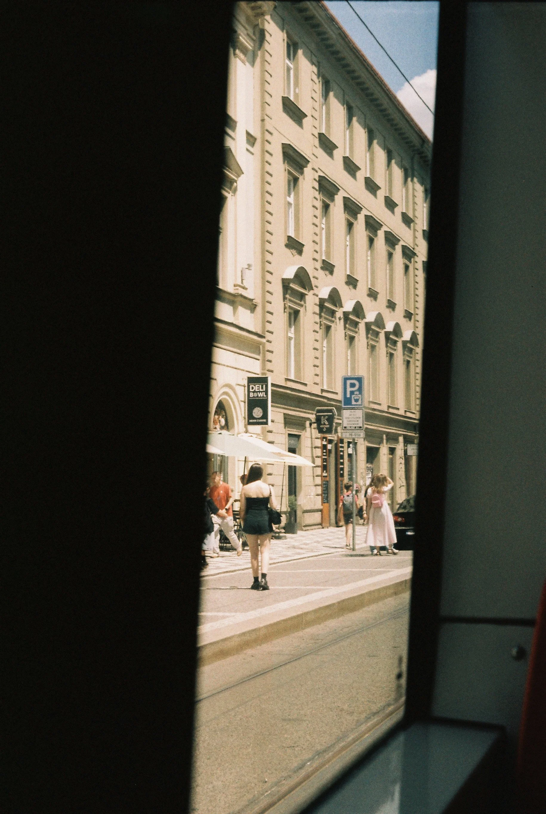  Another frame shot from inside the tram. I really like the idea of photographing from the tram, and I’ve added it to my list of projects: catching moments, only from behind a tram window. __ یه کادربندی و عکس دیگه از توی تراموا. ایده‌ی عکاسی از داخل