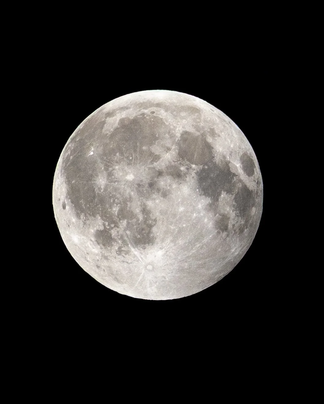 Full moon against a black night sky.