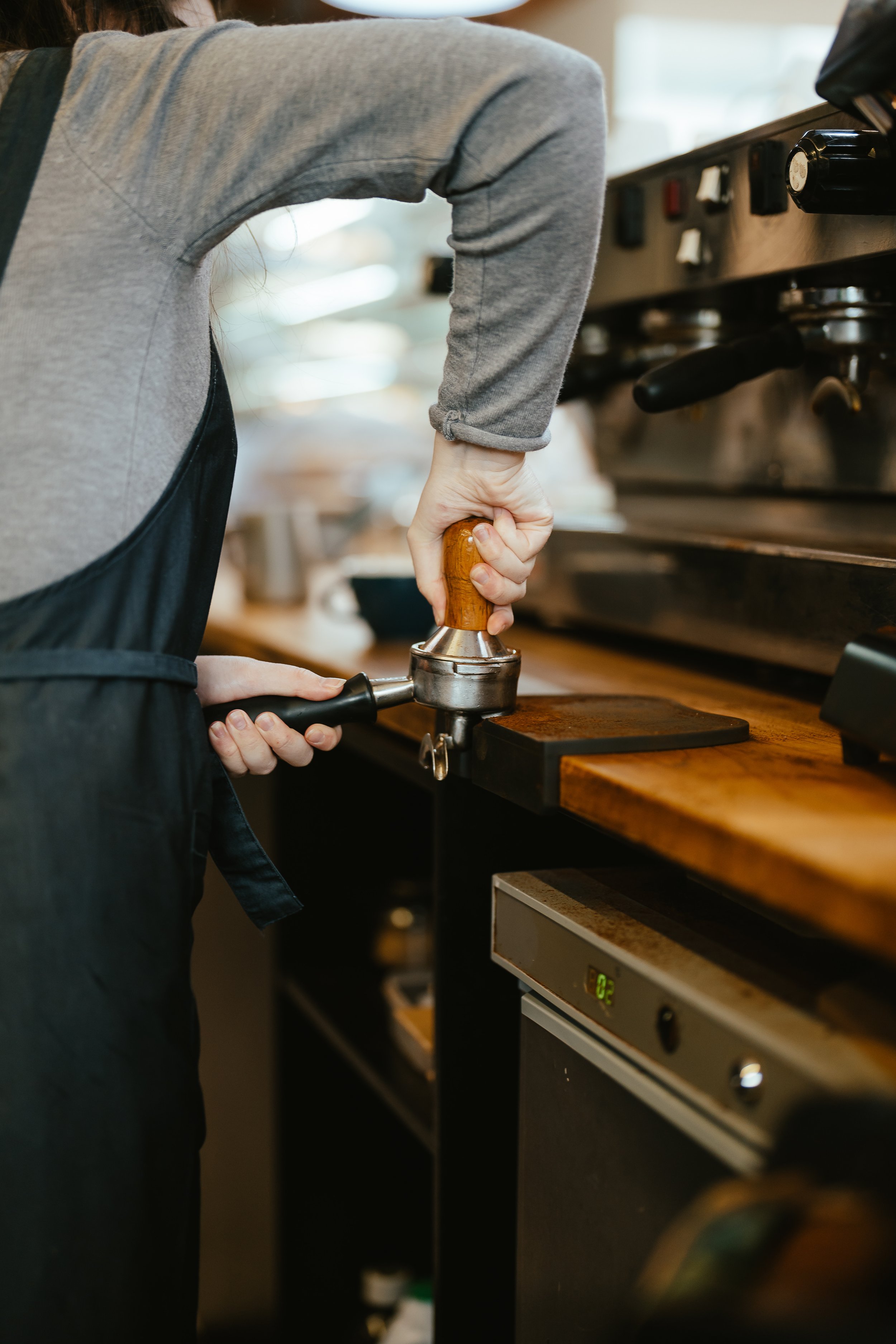 Barista preparing coffee at LOCAL Cafe & Eatery