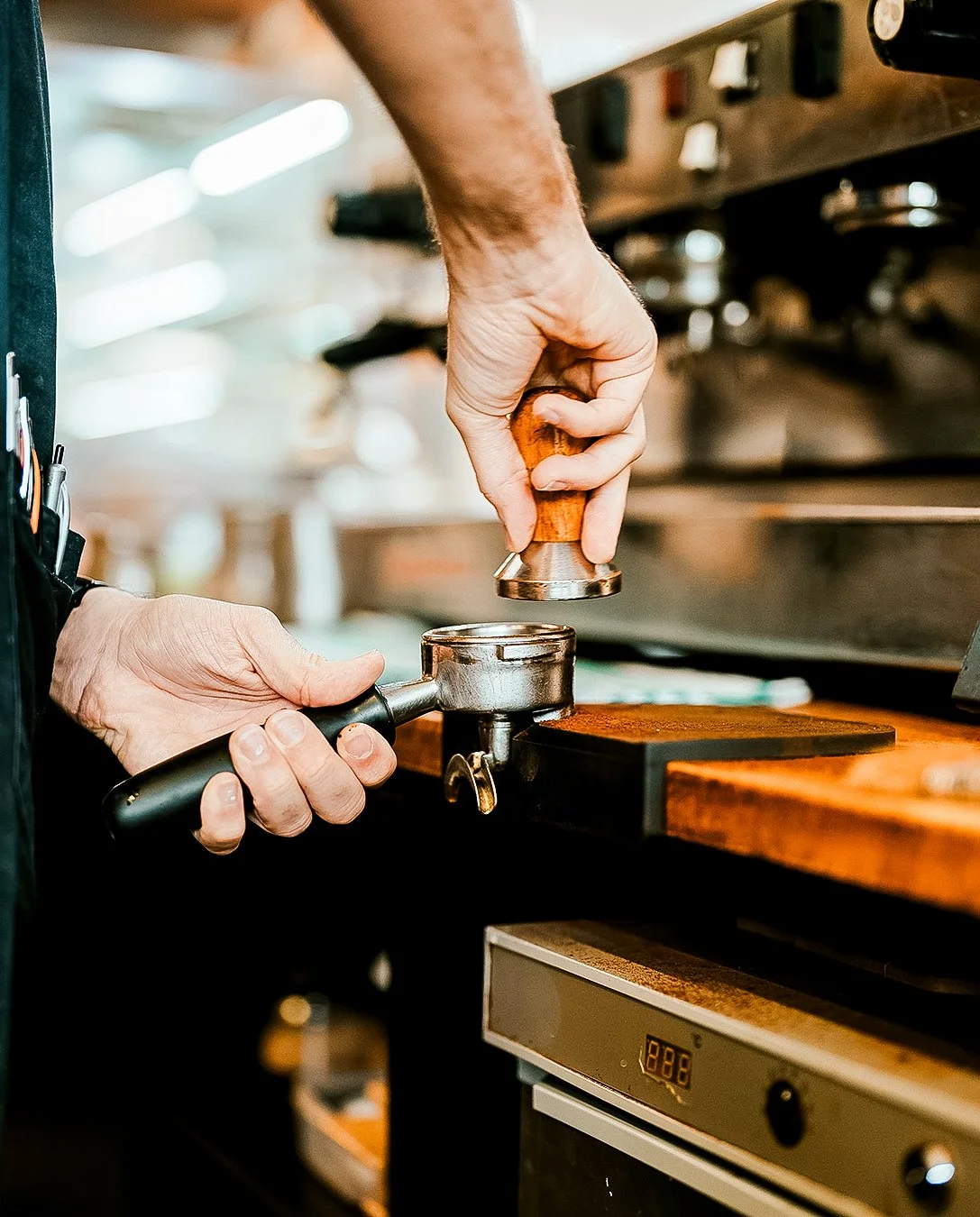 Barista making coffee at LOCAL Cafe & Eatery