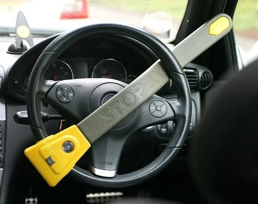 StopLock steering wheel lock showing the single-point locking mechanism