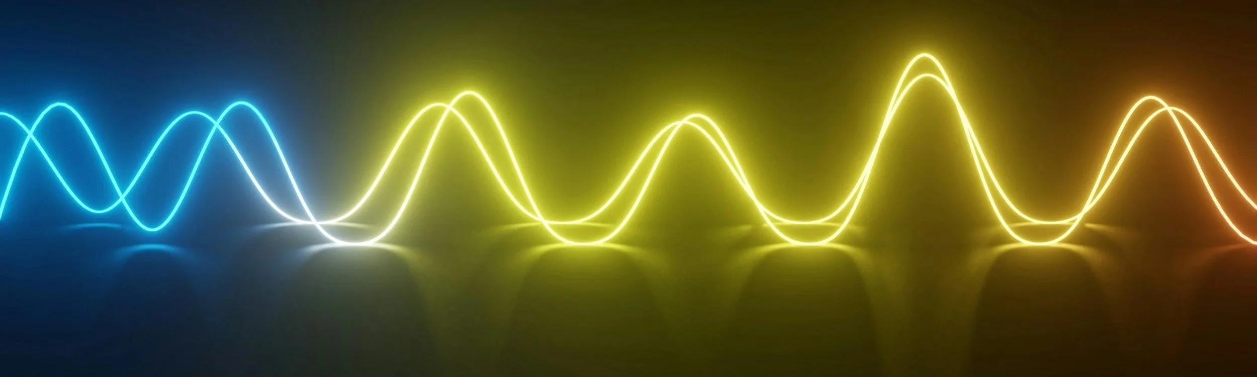 Colorful neon light waves in blue, white, yellow, and orange reflecting on a dark surface.