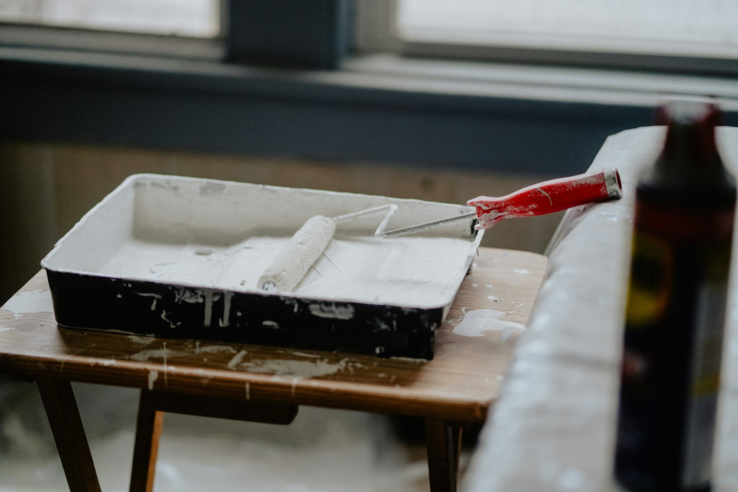 Paint tray with paint and roller