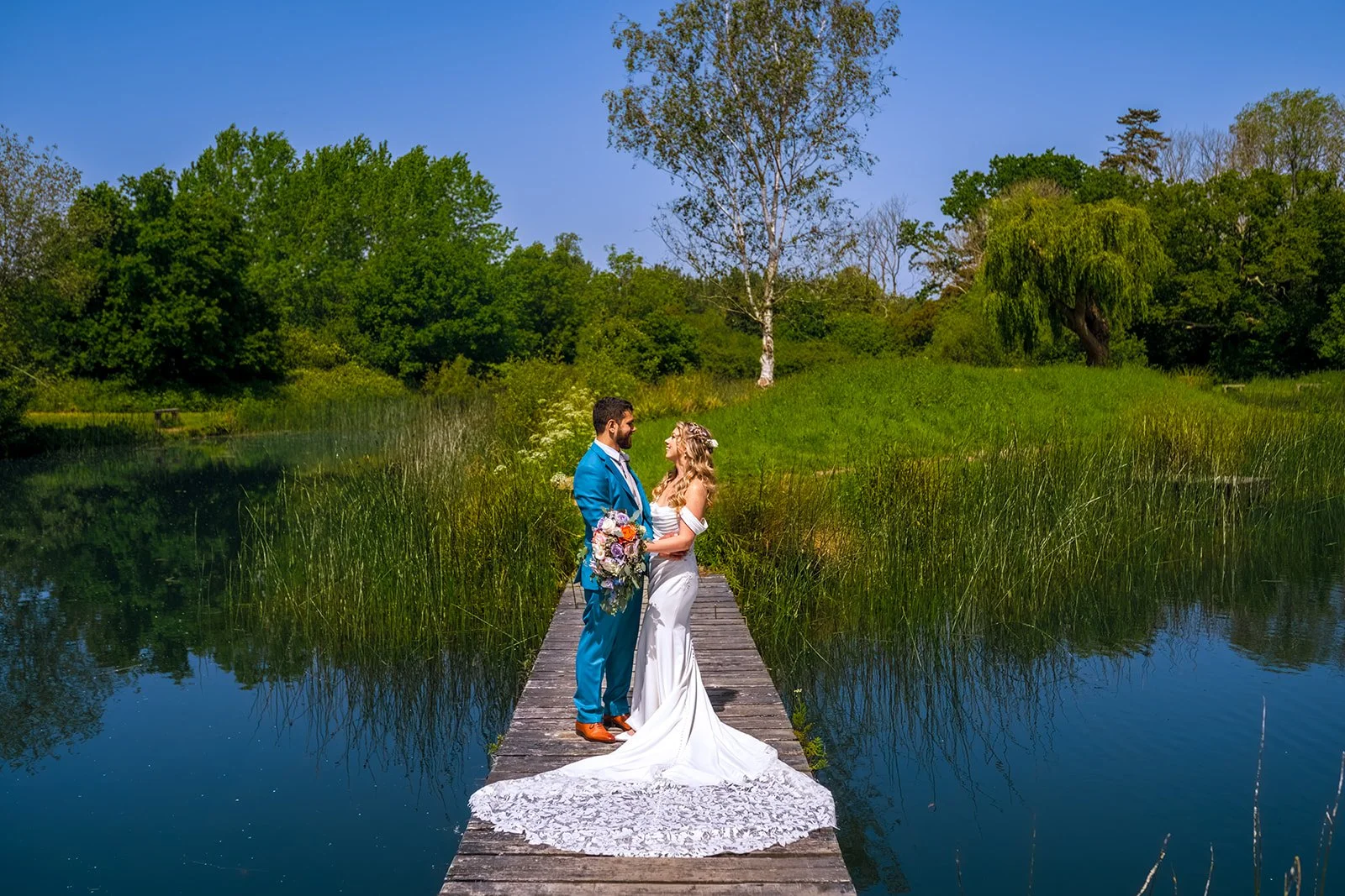 Claire Field Bridal Hair and Make up. A bride and groom getting married.