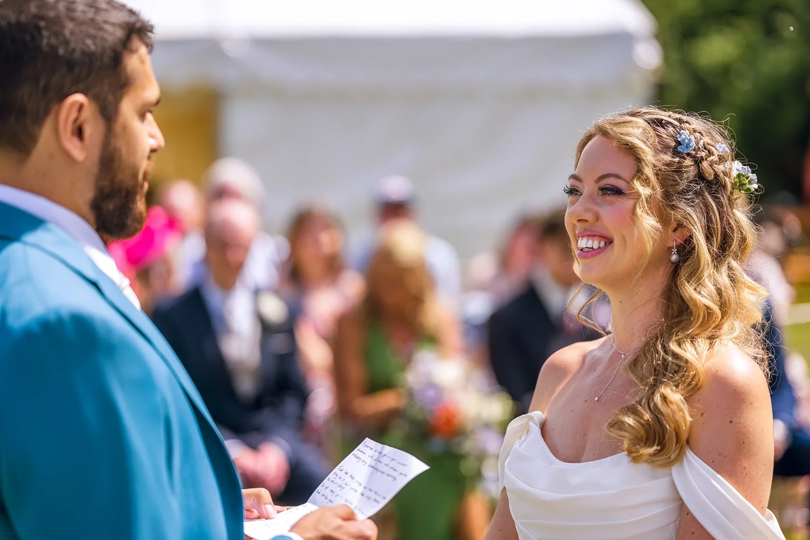 Claire Field Bridal Hair and Make up. A bride and groom getting married. Close up view.