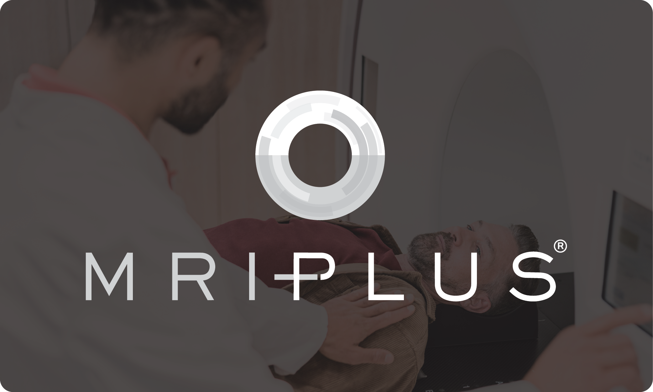 A man is receiving an MRI scan, lying down with staff attending. Overlaid text says 'MRI Plus' in logo form.