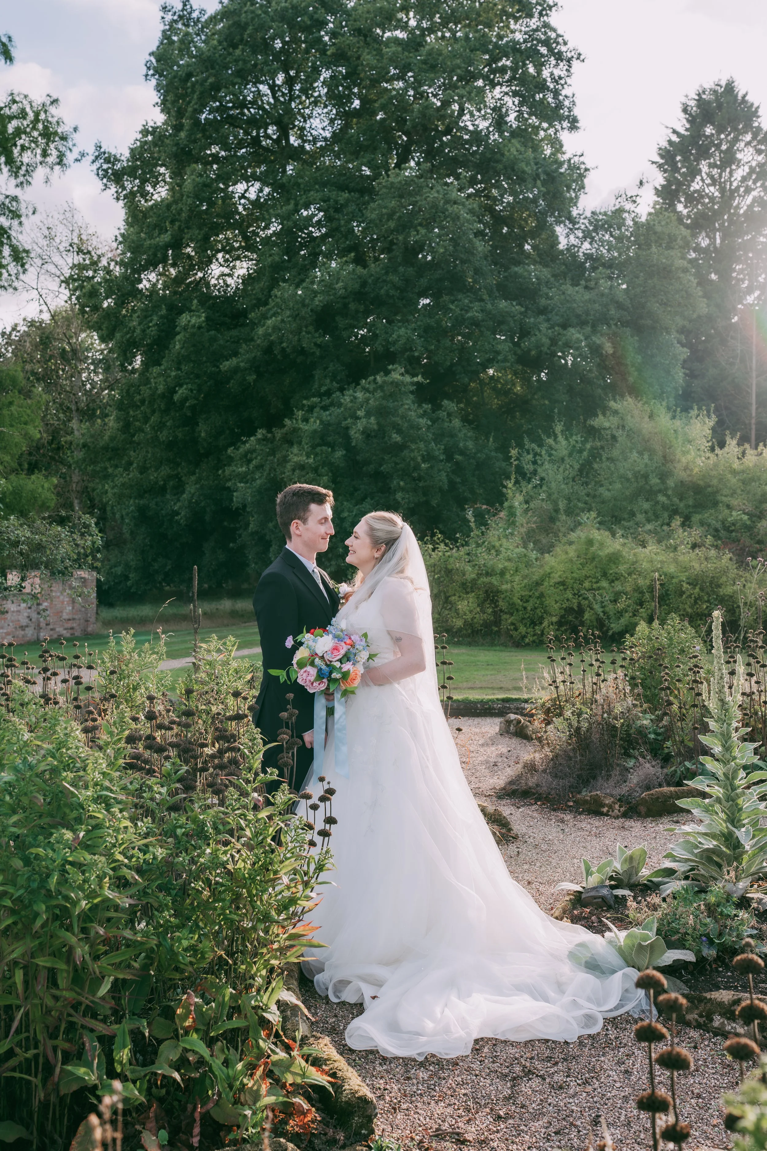 Bride and groom at their wedding at Fable Yard in the East Midlands, photographed in a natural documentary style.