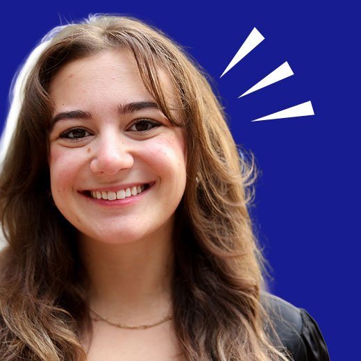 Smiling young woman with light brown hair, wearing a black jacket, against a blue background with graphic white accent lines.
