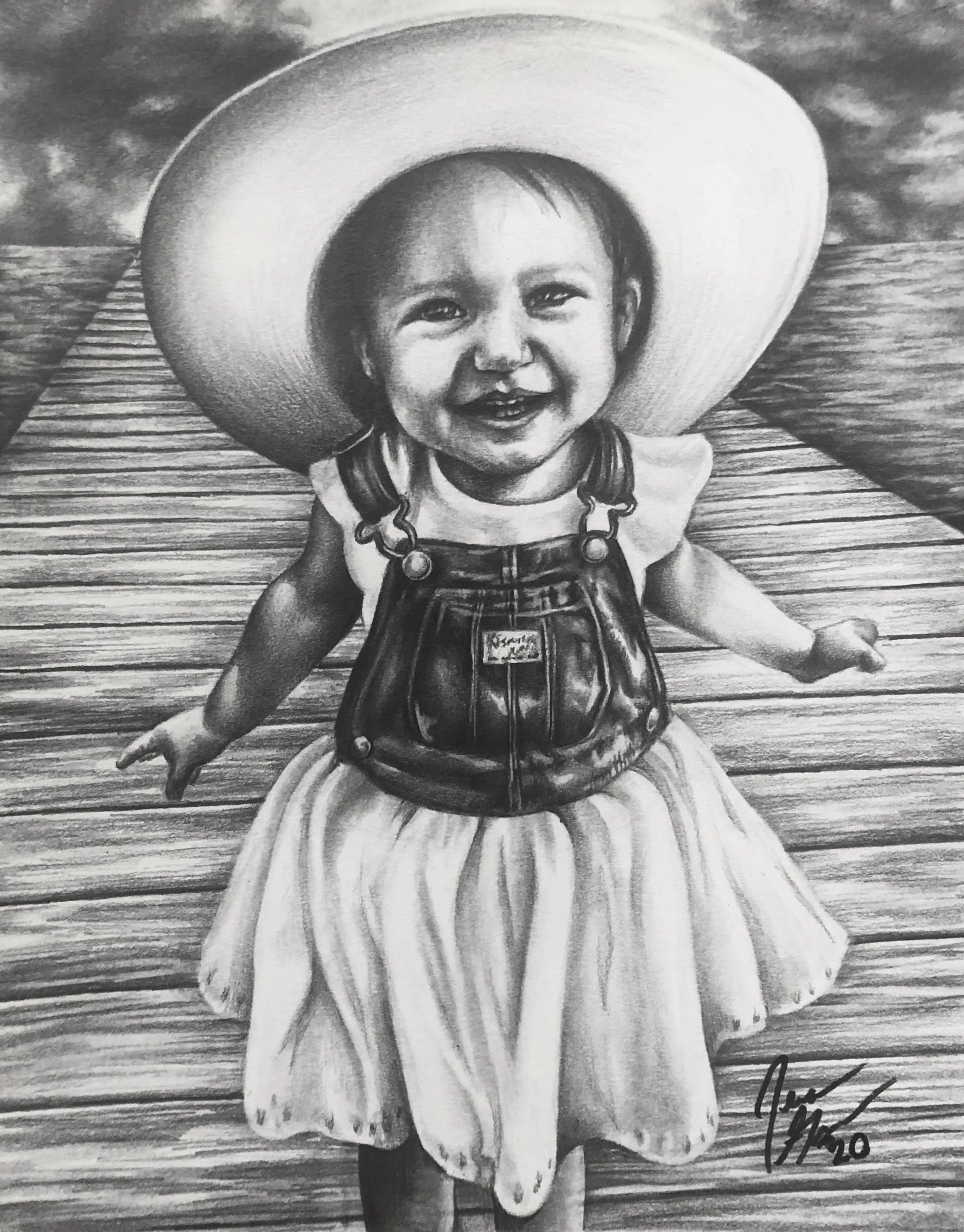 A black and white drawing of a toddler girl sitting on a wooden dock by the water, wearing a large sun hat, a T-shirt, and overalls, smiling at the camera.