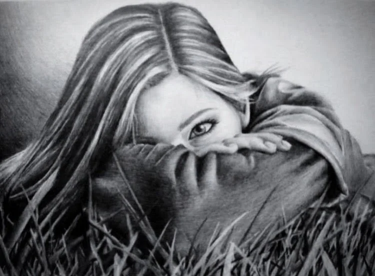 Black and white drawing of a girl with long hair, resting her head on her arm, partly covering her face, with only one eye visible, surrounded by grass.