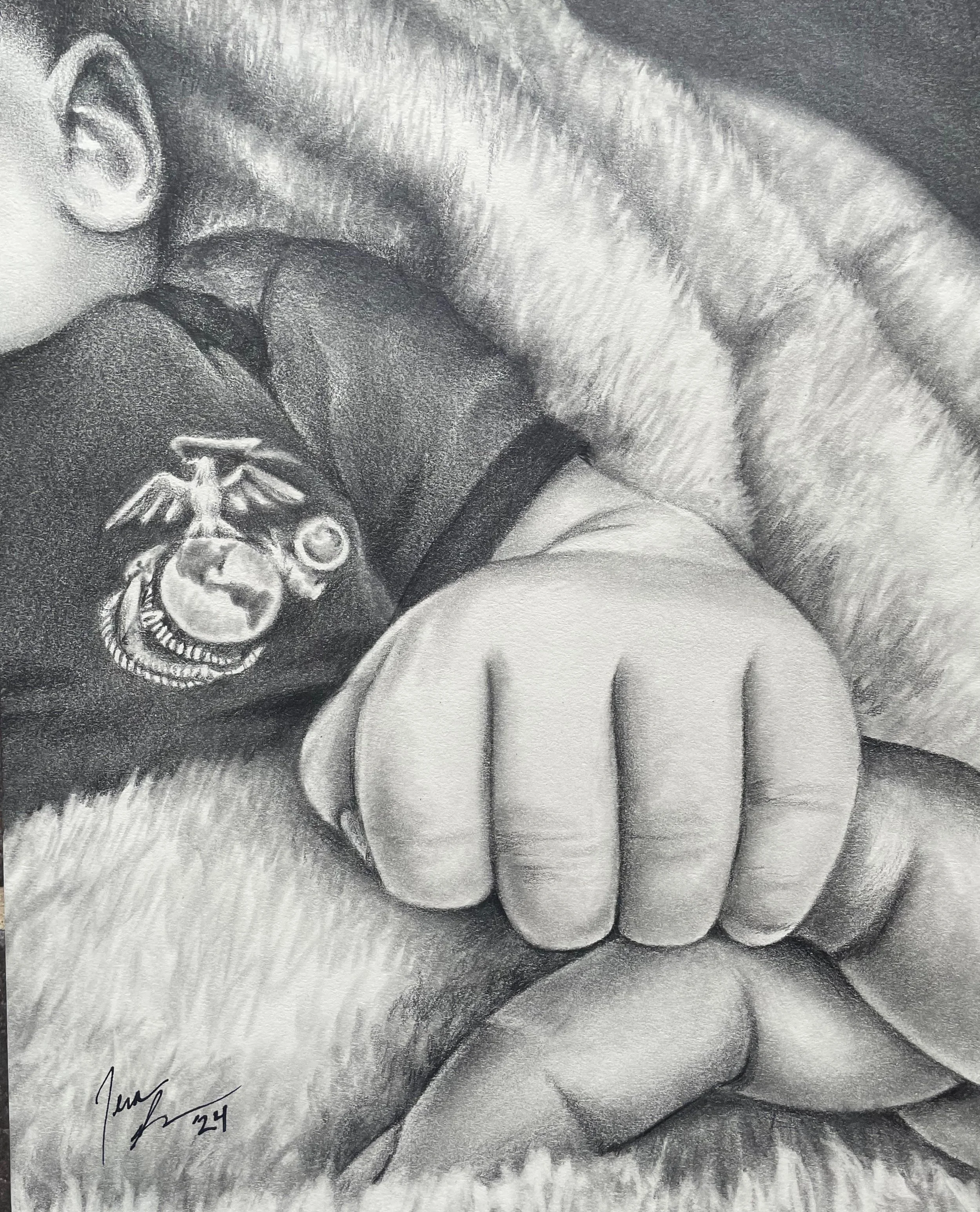A detailed black and white pencil sketch of a hand gripping a piece of cloth, with a small American flag-themed badge or patch near the wrist. The sketch includes detailed shading of the skin, nails, and fabric, with shading emphasizing texture and d