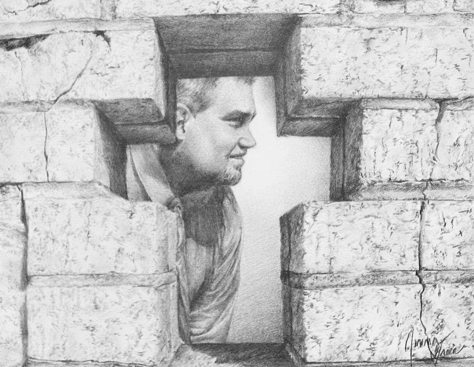 A pencil drawing of a man peeking through a cross-shaped opening in a stone wall.